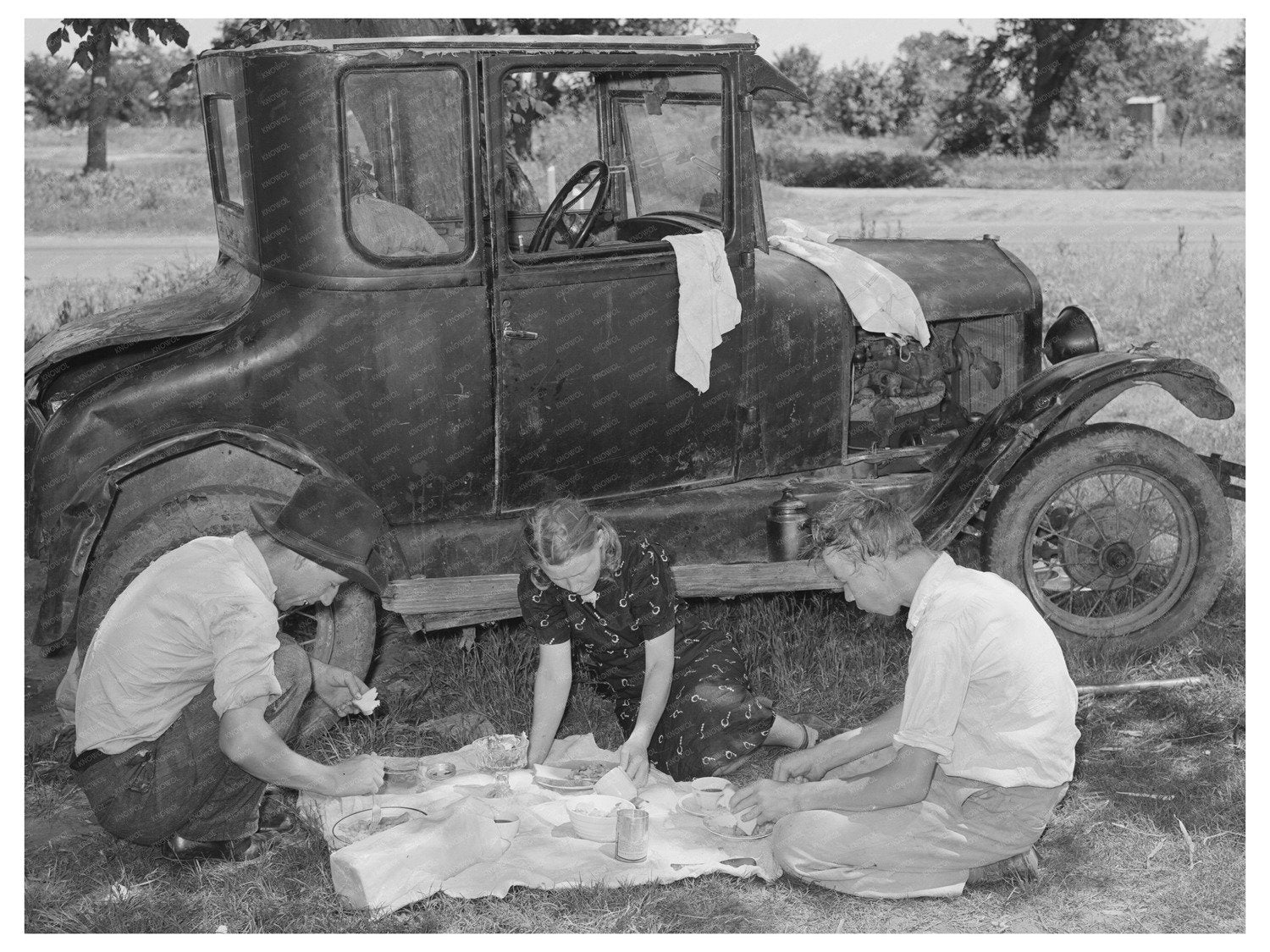 Migrant Workers Dining by Car Near Prague Oklahoma 1939