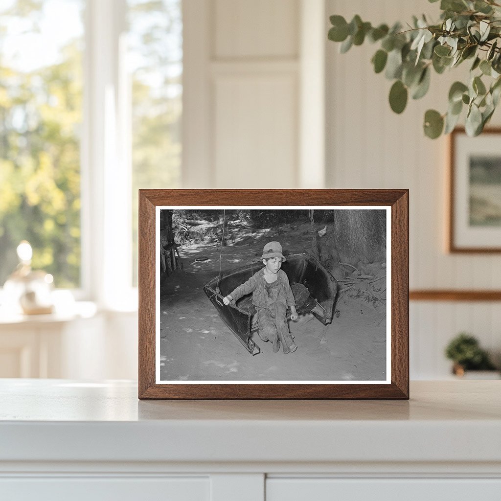 Boy Swinging with Father at WPA in Oklahoma June 1939