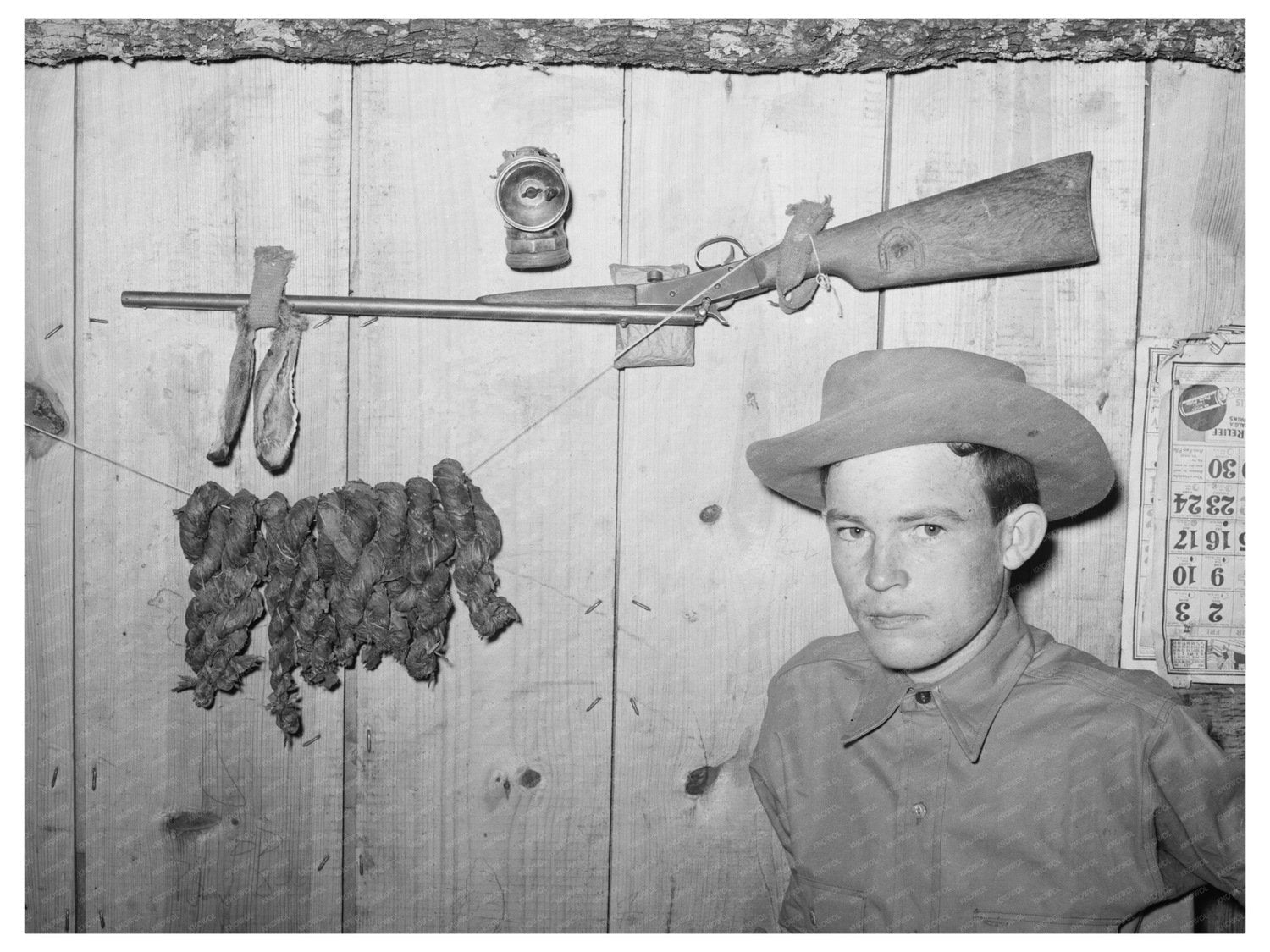 Son of Laborer with Rifle and Tobacco June 1939