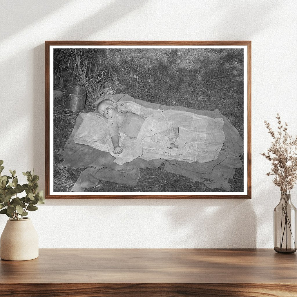 1939 Baby Sleeping on Ground in Oklahoma Labor Camp