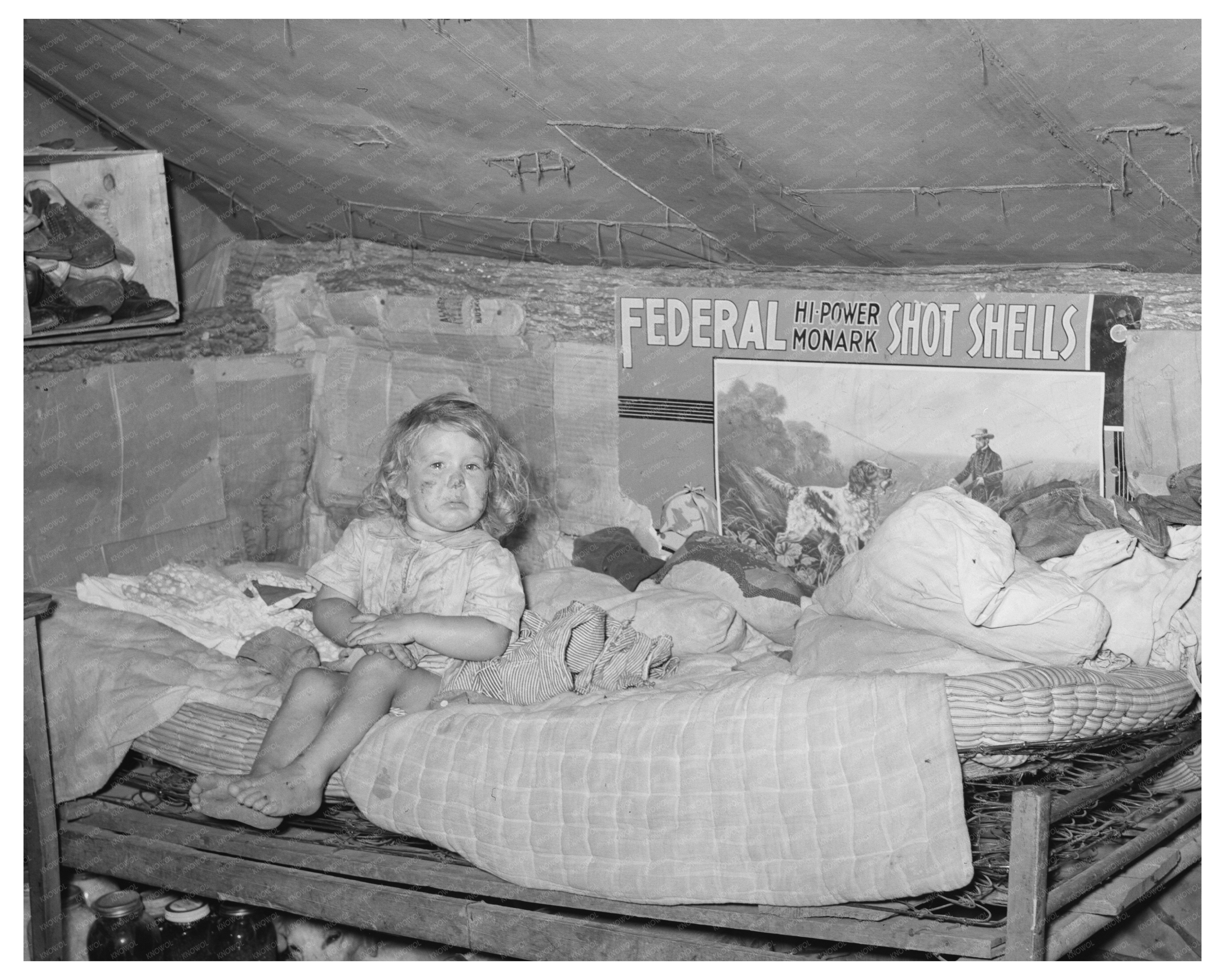 Child on Bed in Tent Home Sallisaw Oklahoma June 1939
