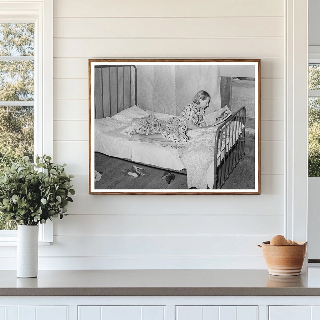Daughter of Tenant Farmer Reading in Sallisaw 1939