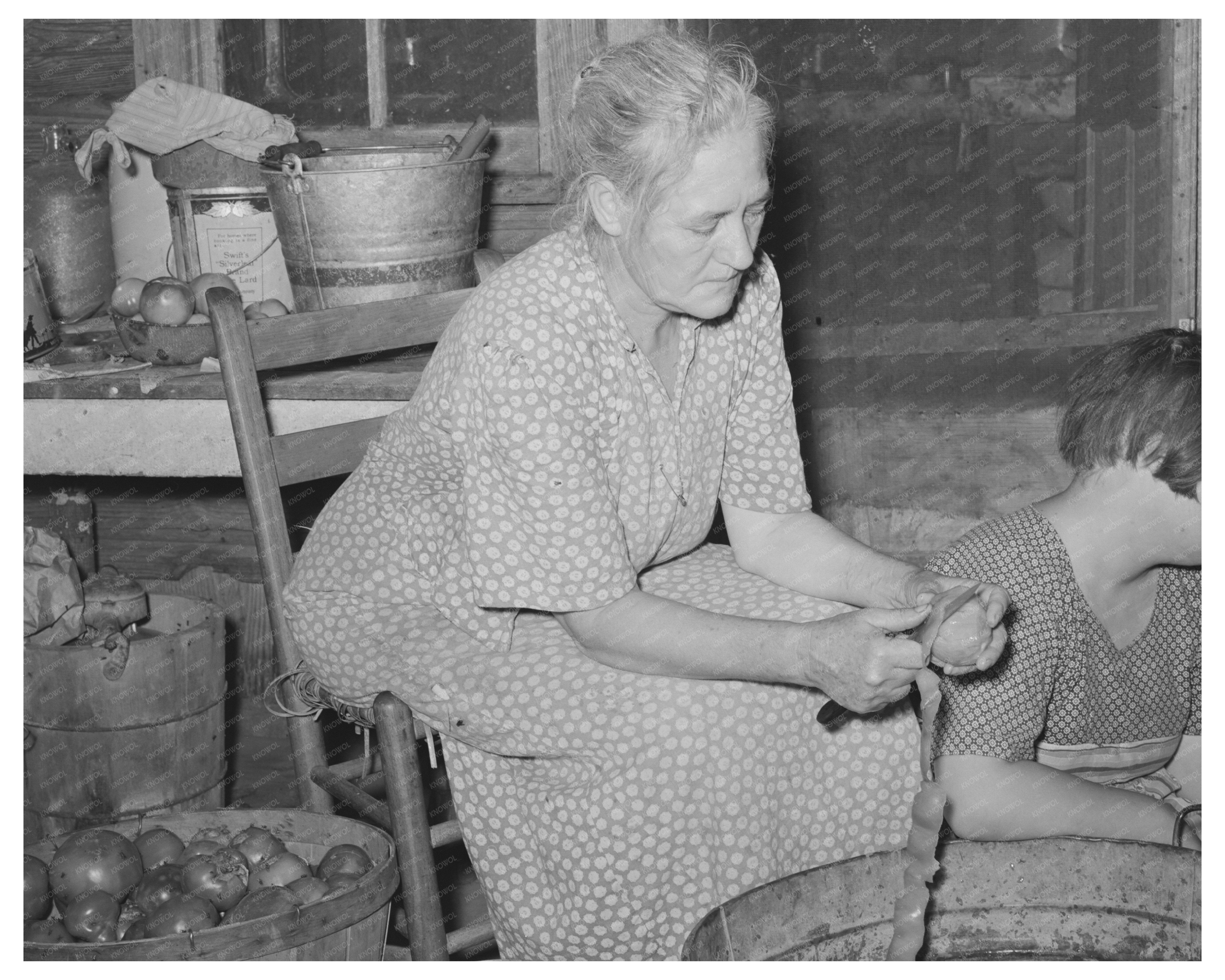 Wife of Tenant Farmer Peeling Tomatoes Muskogee 1939