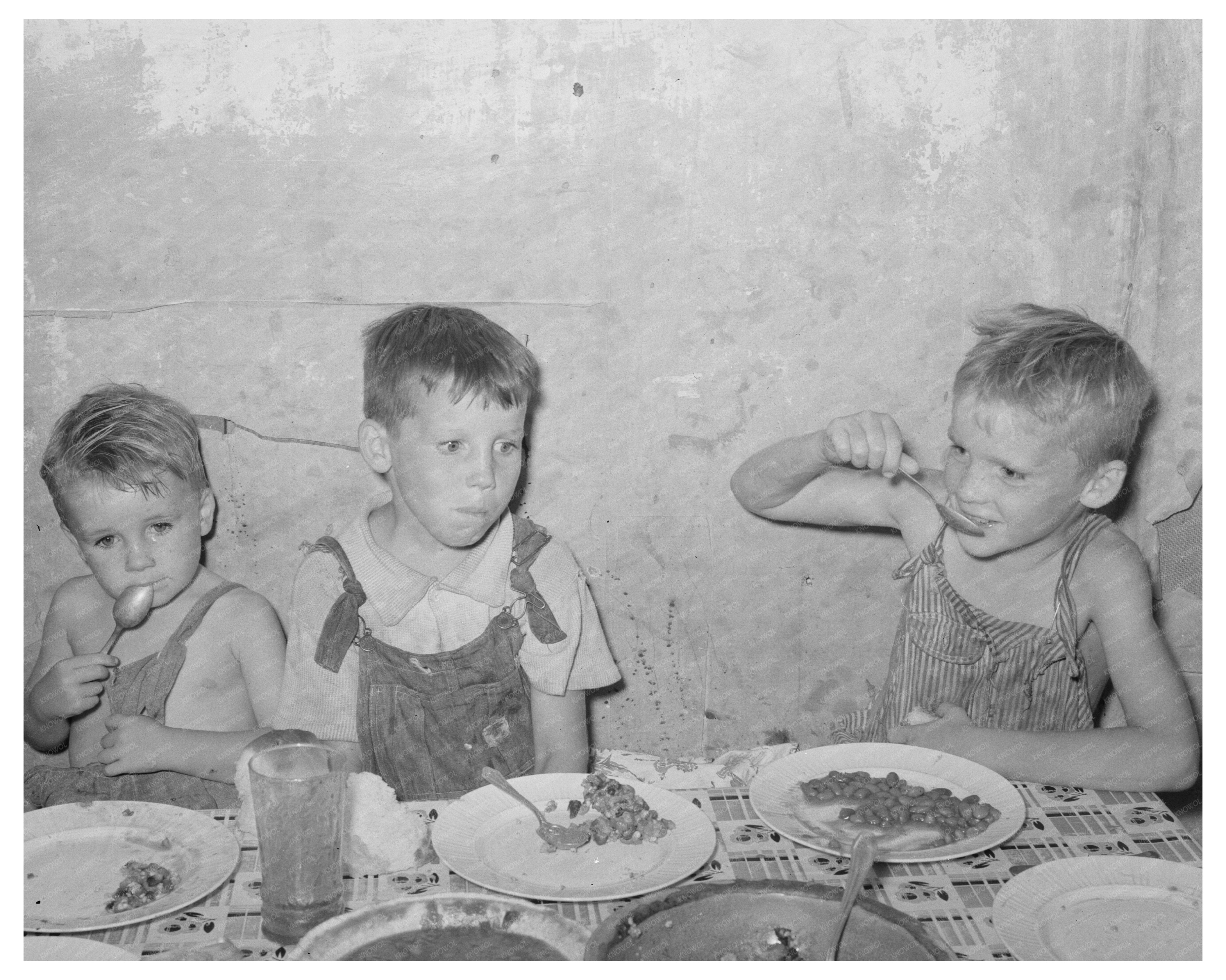 Children of Unemployed Oil Worker Eating Supper 1939