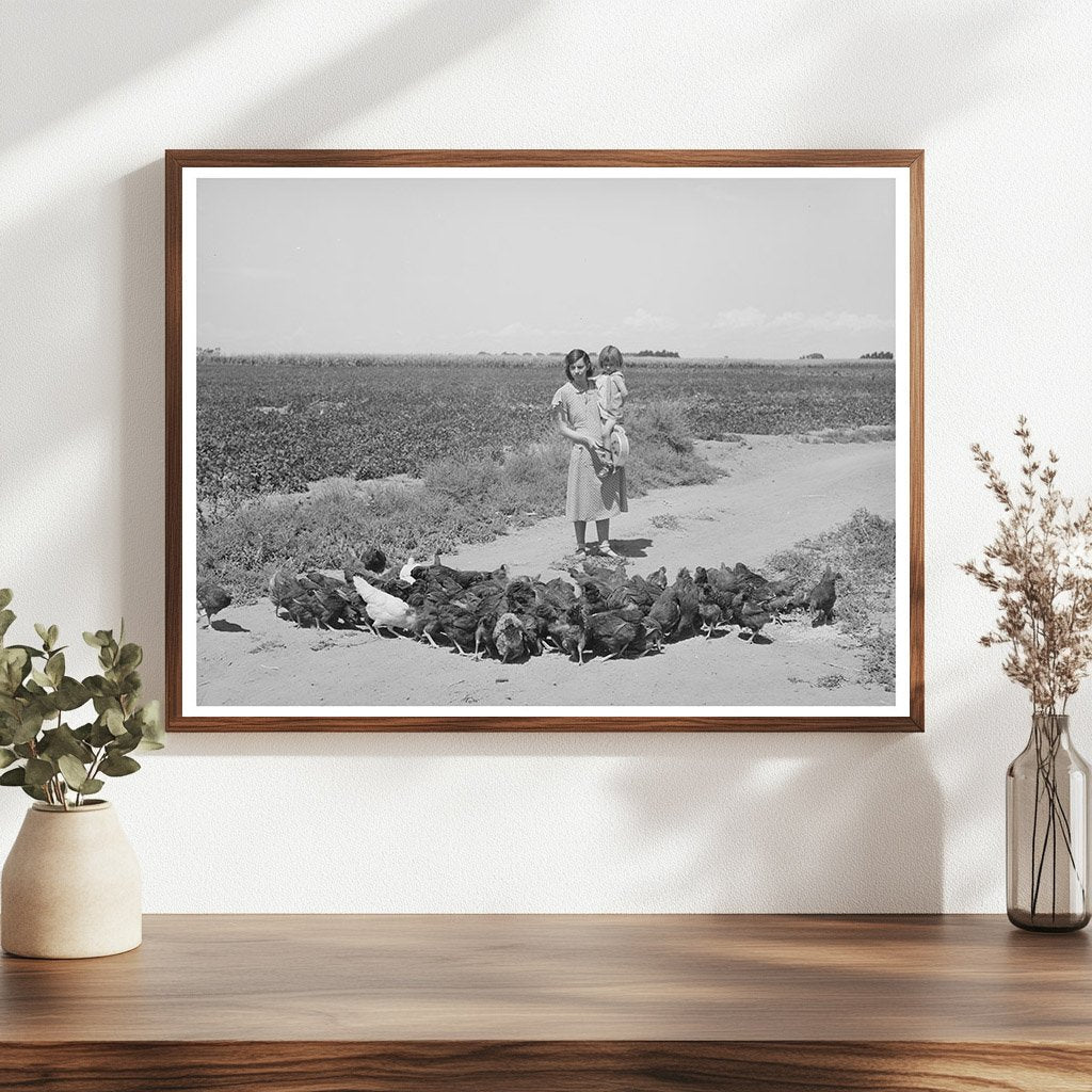 Mrs. Ernest W. Kirk Jr. Feeding Chickens Colorado 1939
