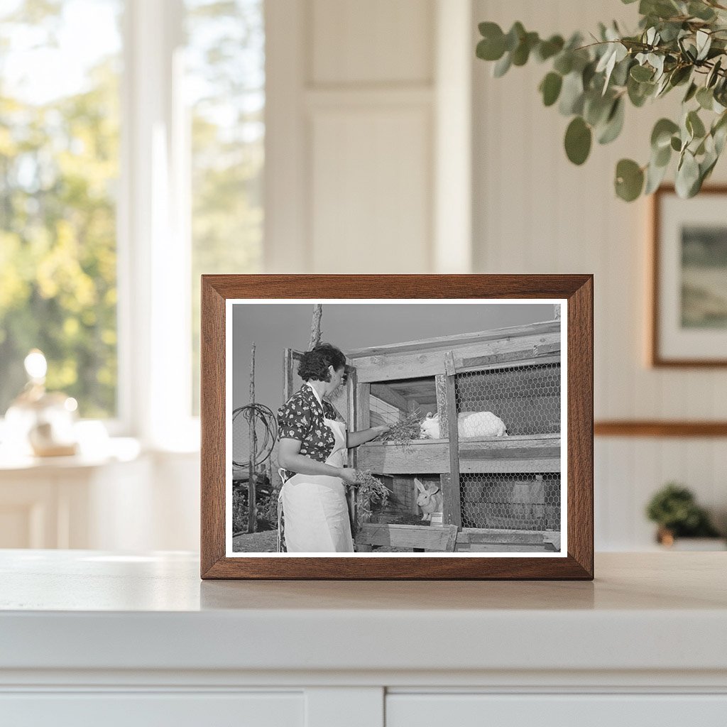 Ofelia Trujillo Feeding Rabbits in Taos New Mexico 1939