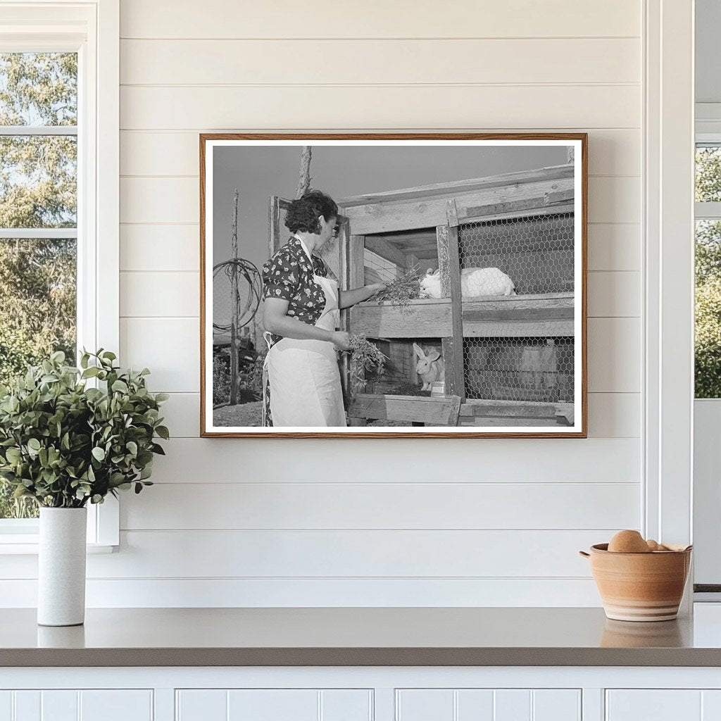 Ofelia Trujillo Feeding Rabbits in Taos New Mexico 1939