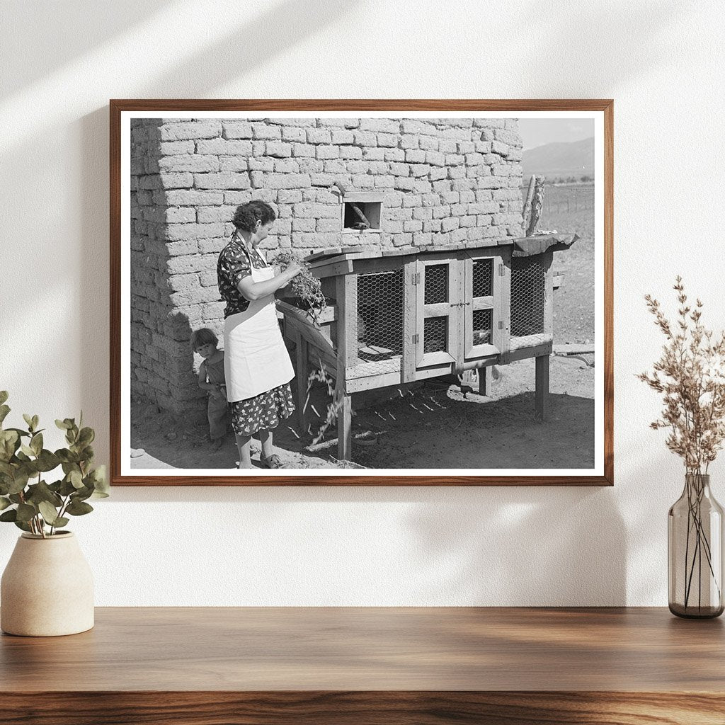 Ofelia Trujillo Sandoval Feeding Rabbits Taos 1939