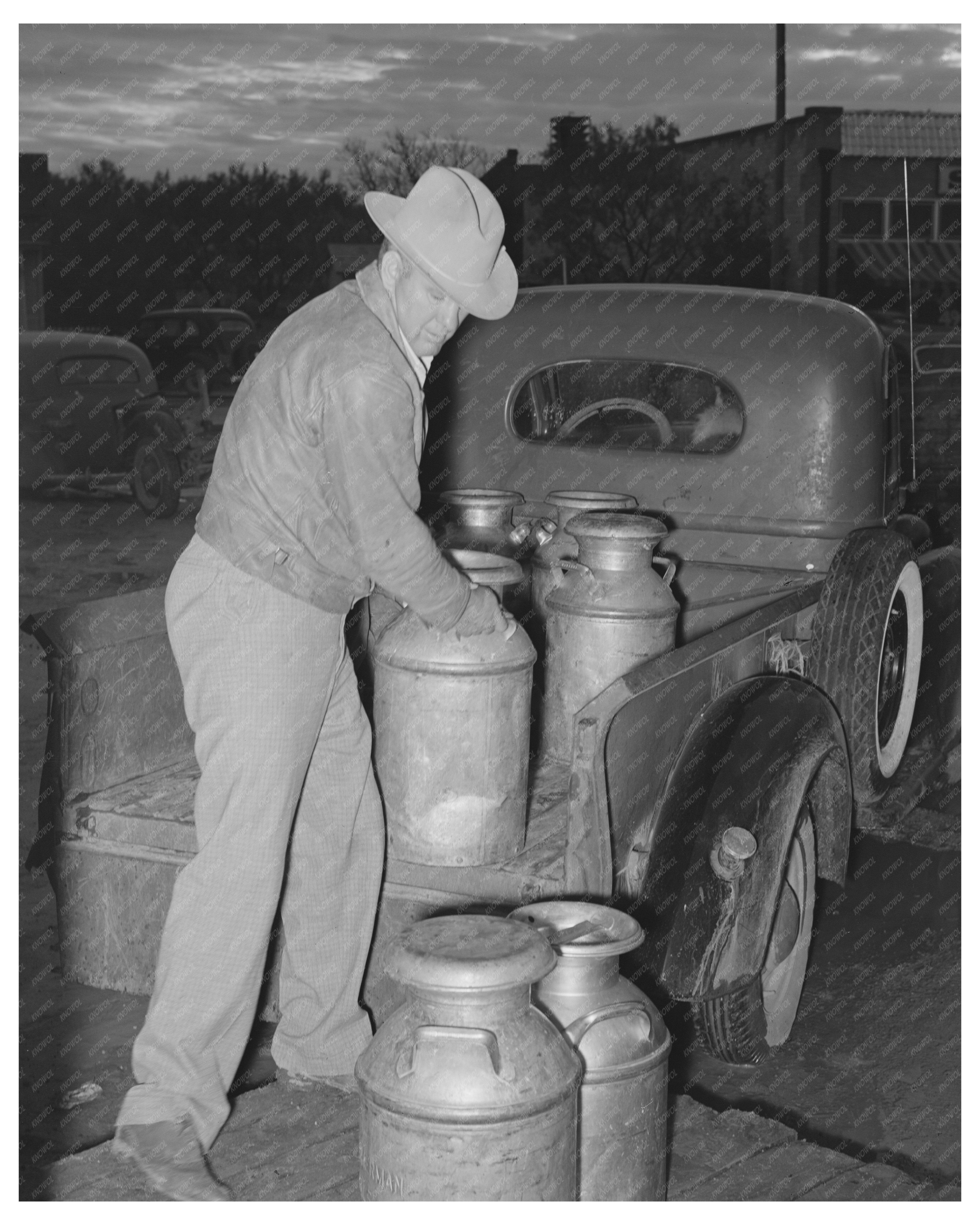 Farmer Unloading Milk at San Angelo Creamery 1939