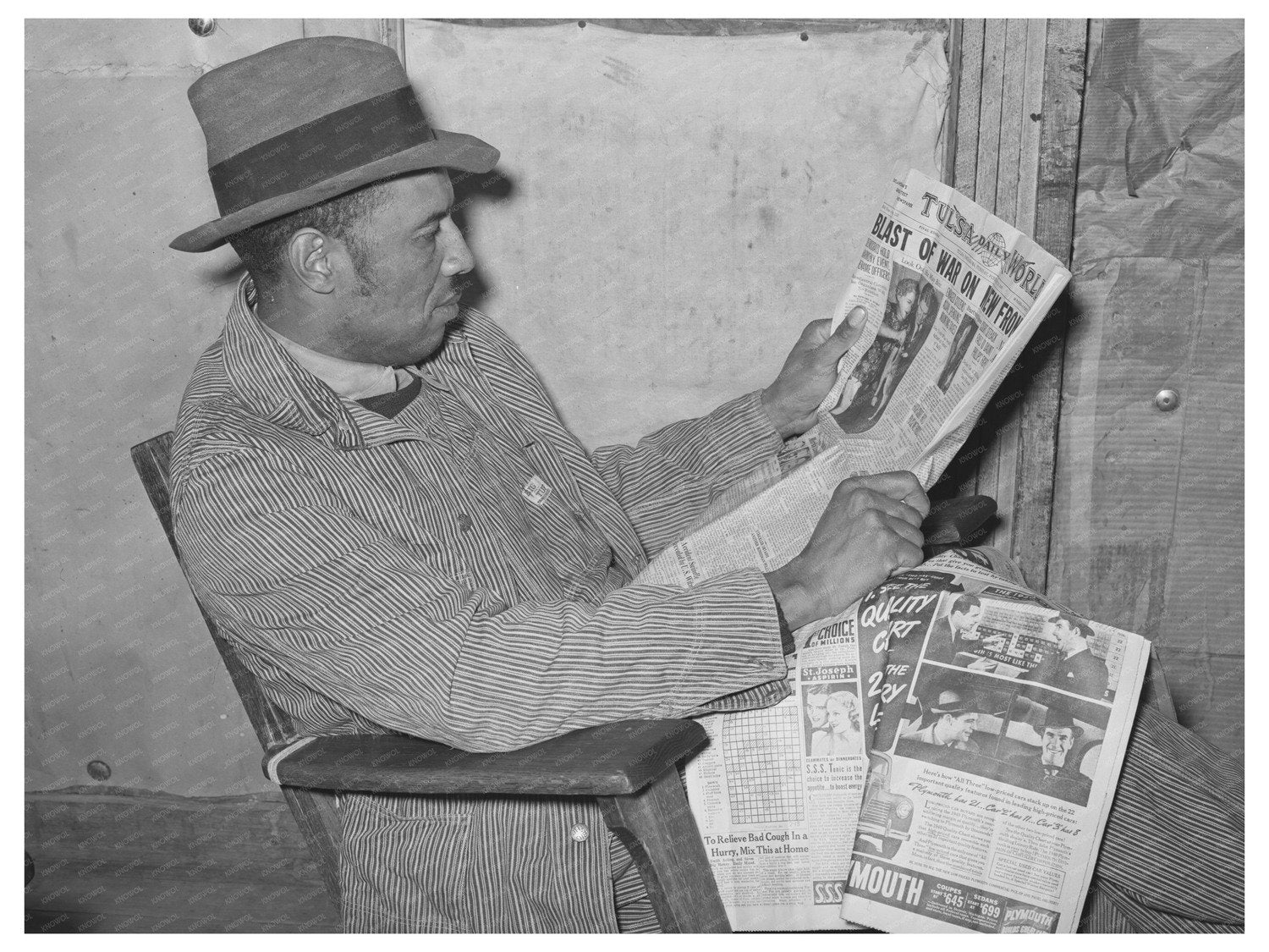 Pomp Hall Reading Newspaper in Oklahoma February 1944