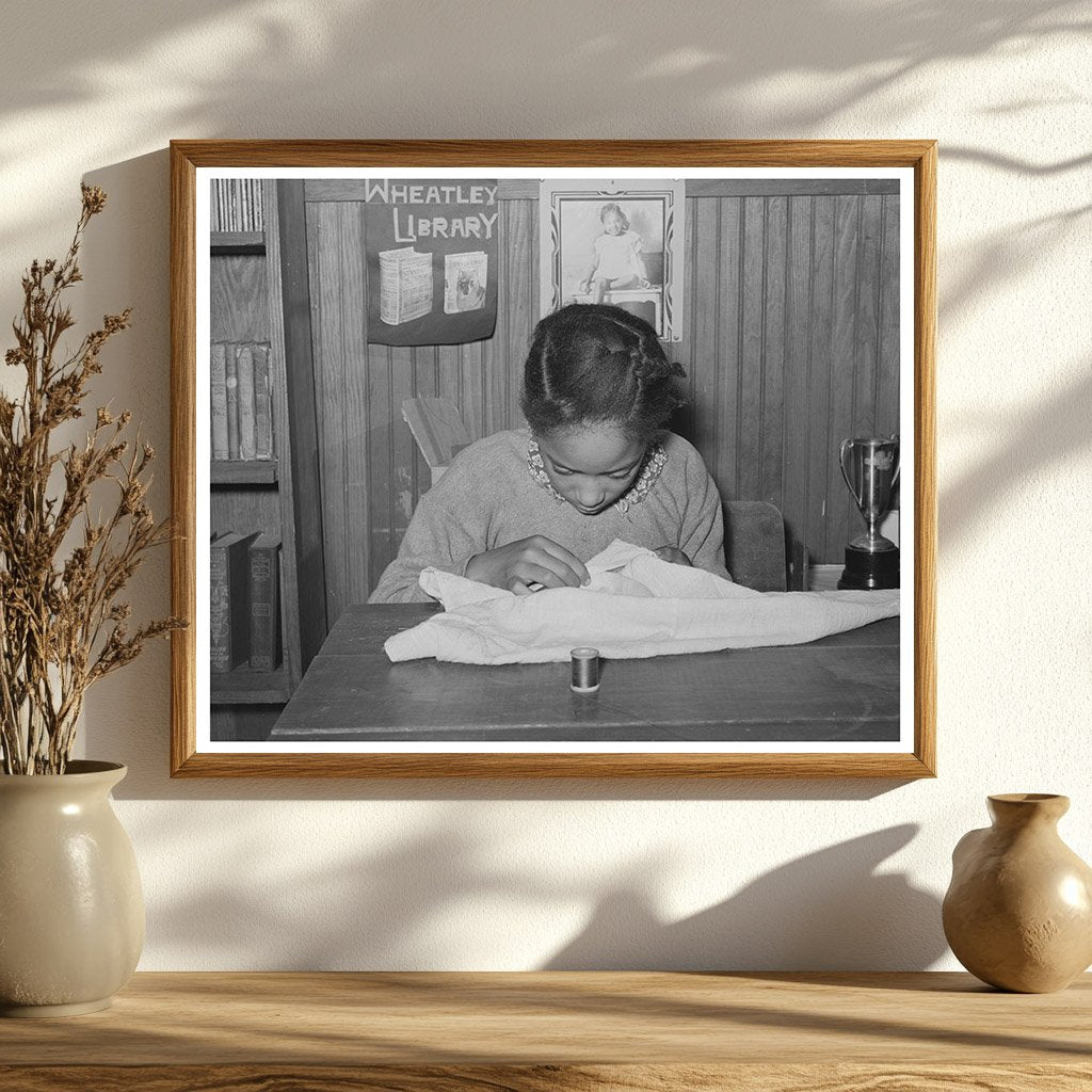 Daughter of Tenant Farmer Sewing in Oklahoma 1944