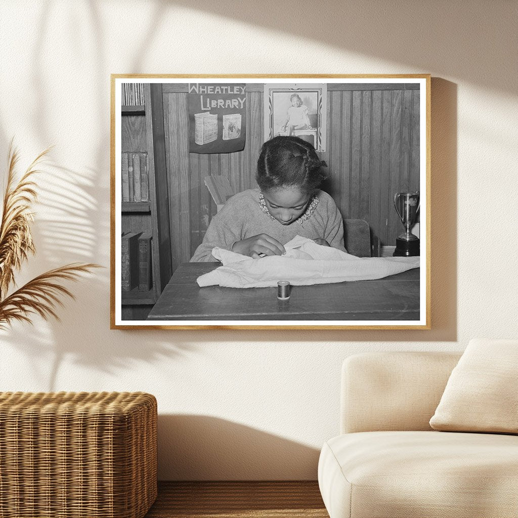 Daughter of Tenant Farmer Sewing in Oklahoma 1944
