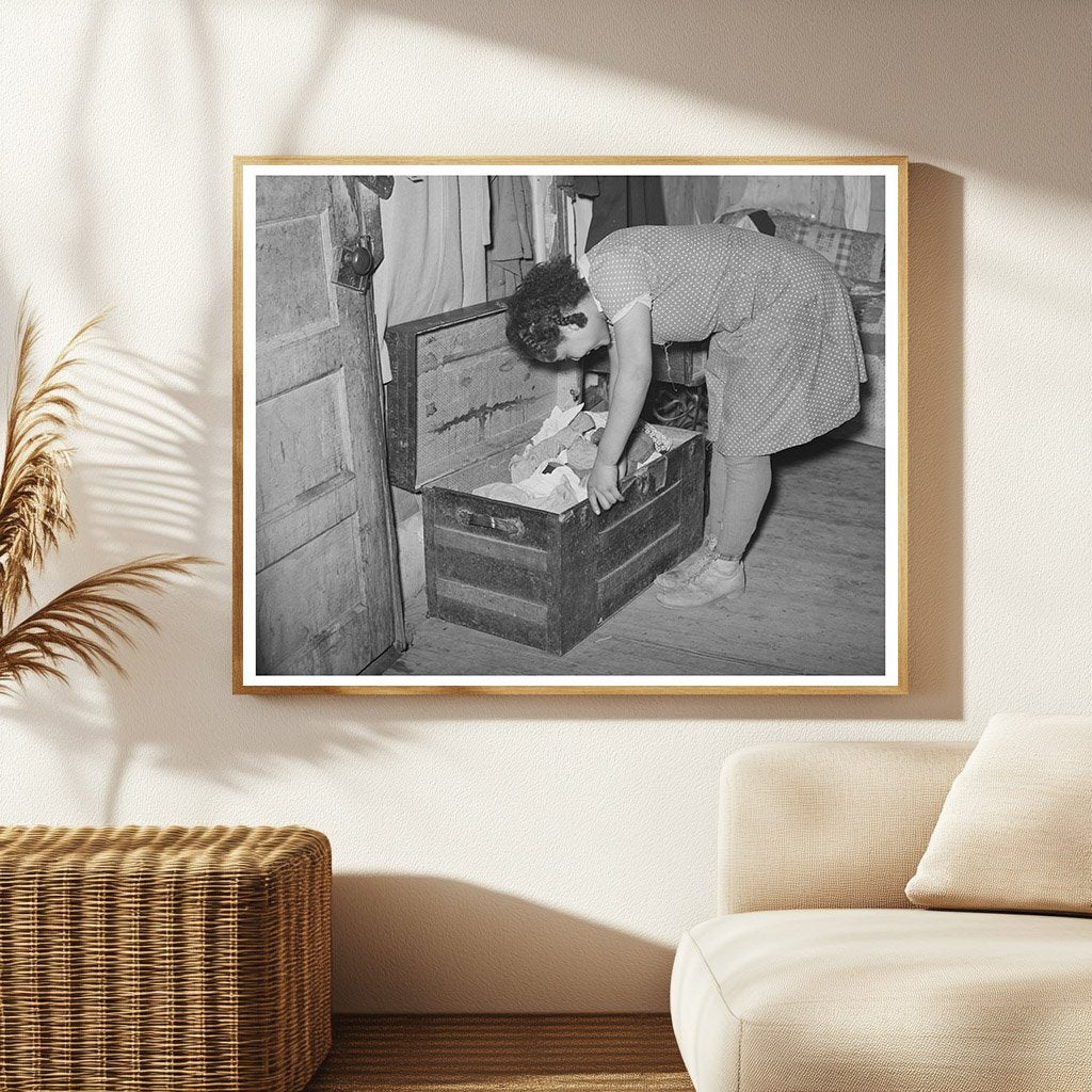 Girl Exploring Trunk of Clothing in Oklahoma February 1940