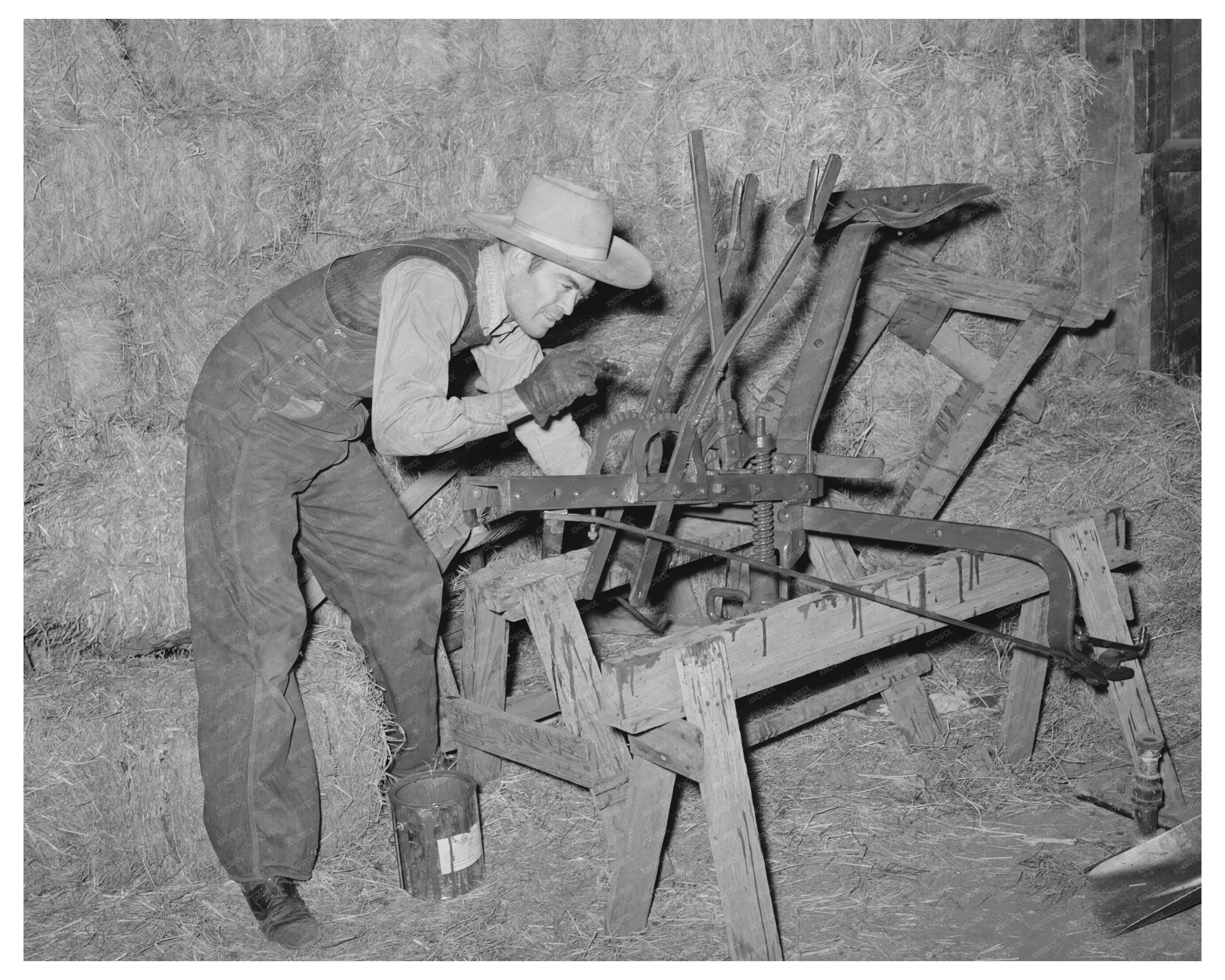 Oklahoma City Feed Mill Owner Repainting Plow 1940