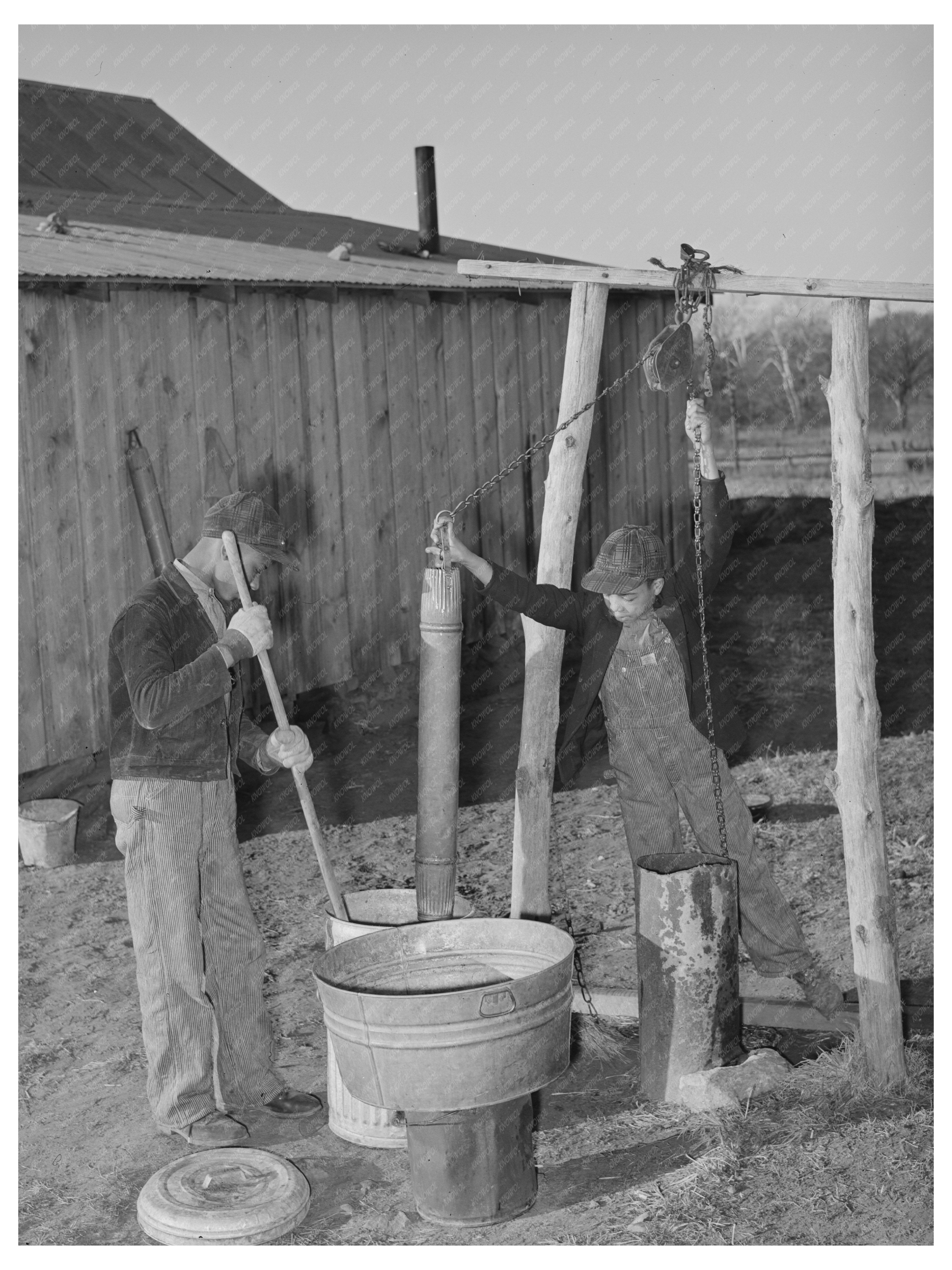 Sons of Pomp Hall Feeding Hogs Oklahoma 1944