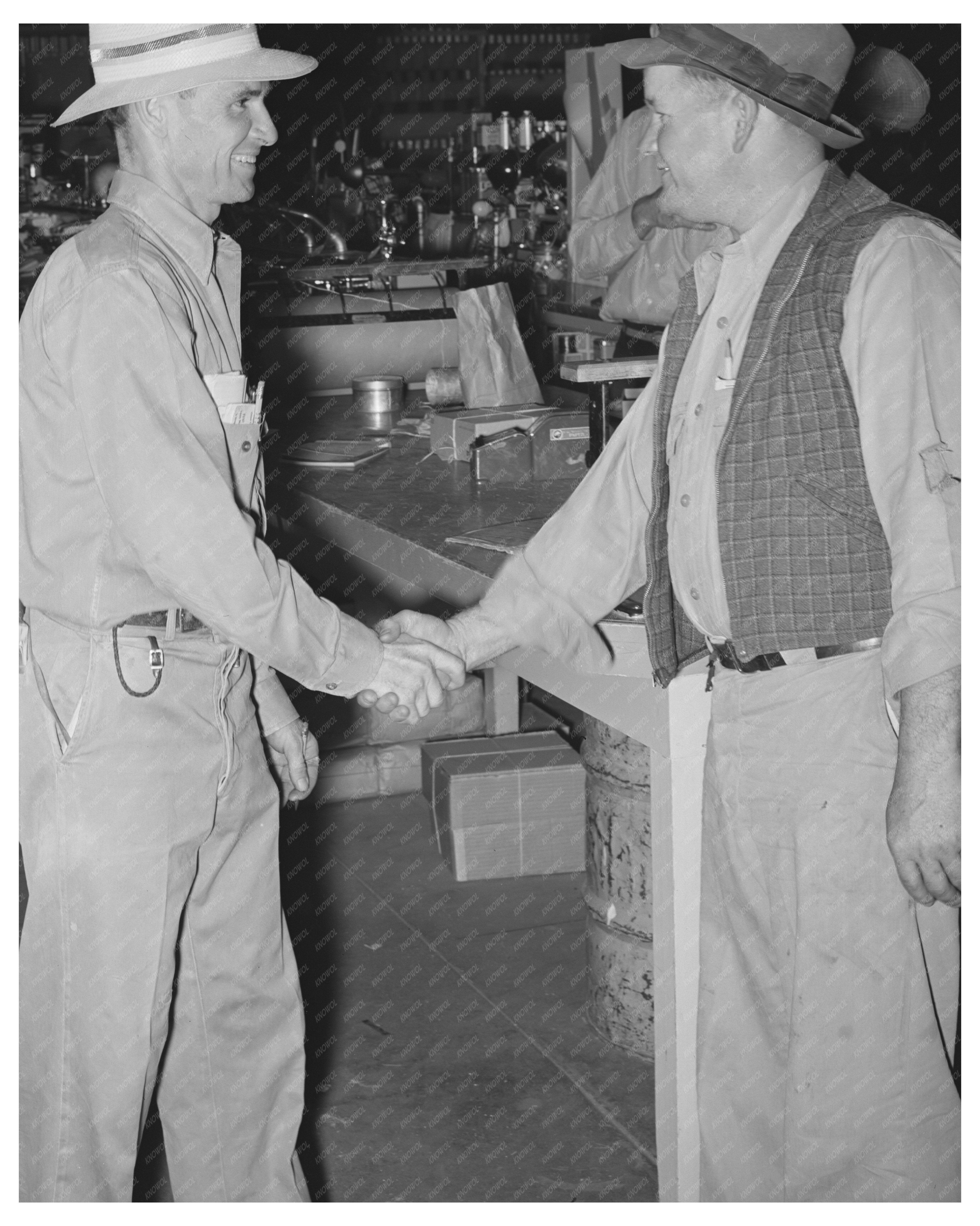 Farmers Collaborate at United Producers Cooperative 1940