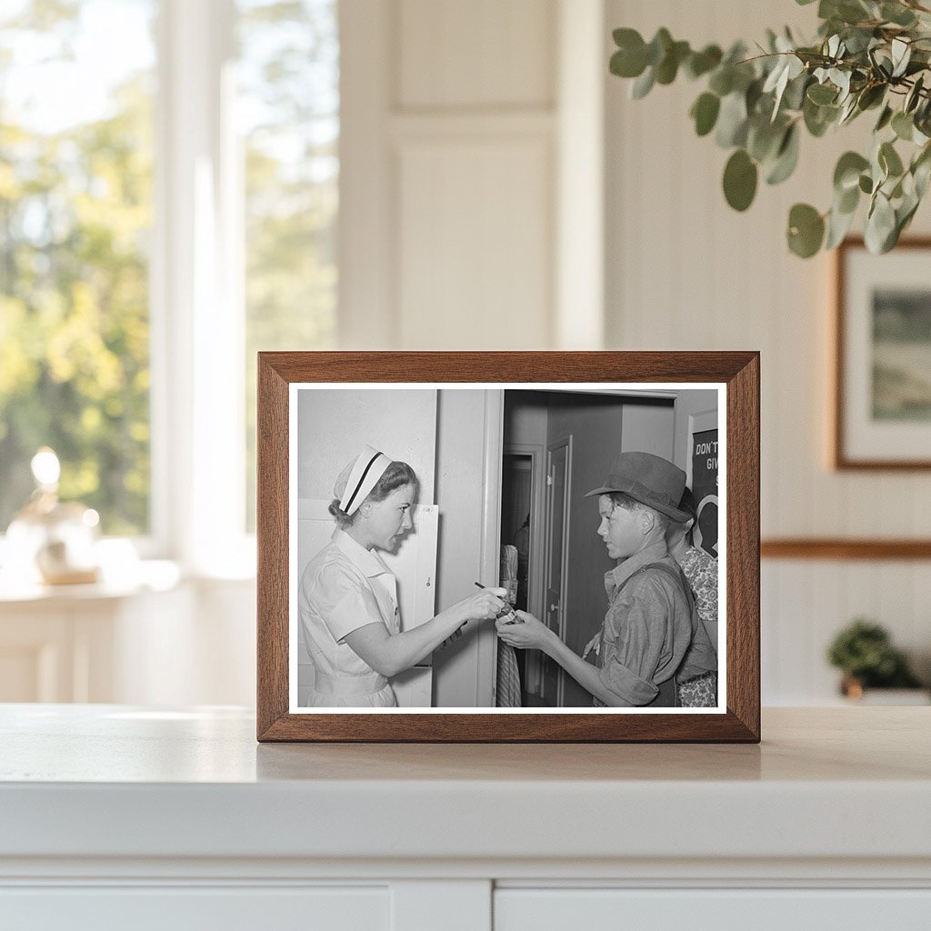 Nurse Instructs Migratory Laborers Son on Medication 1940