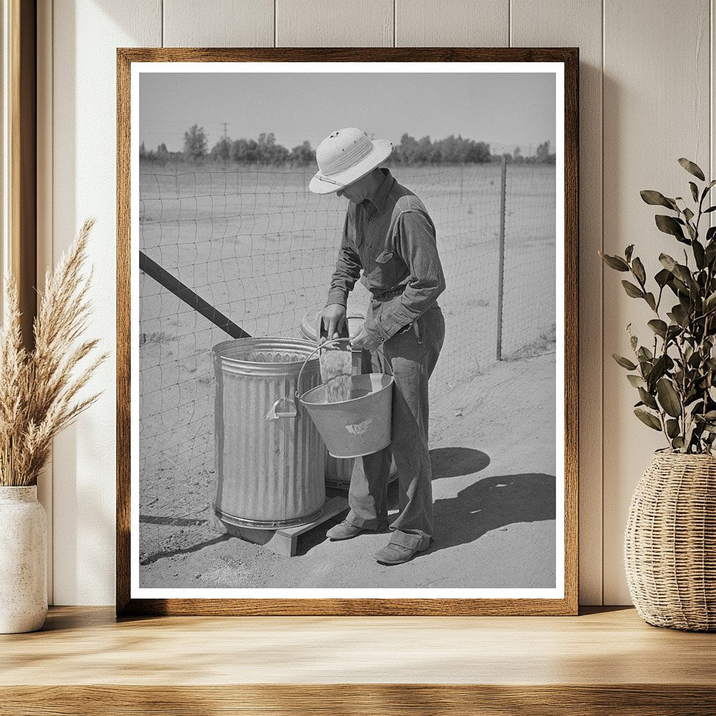 1944 Arizona Farmworker Feeding Chickens in Chandler Unit