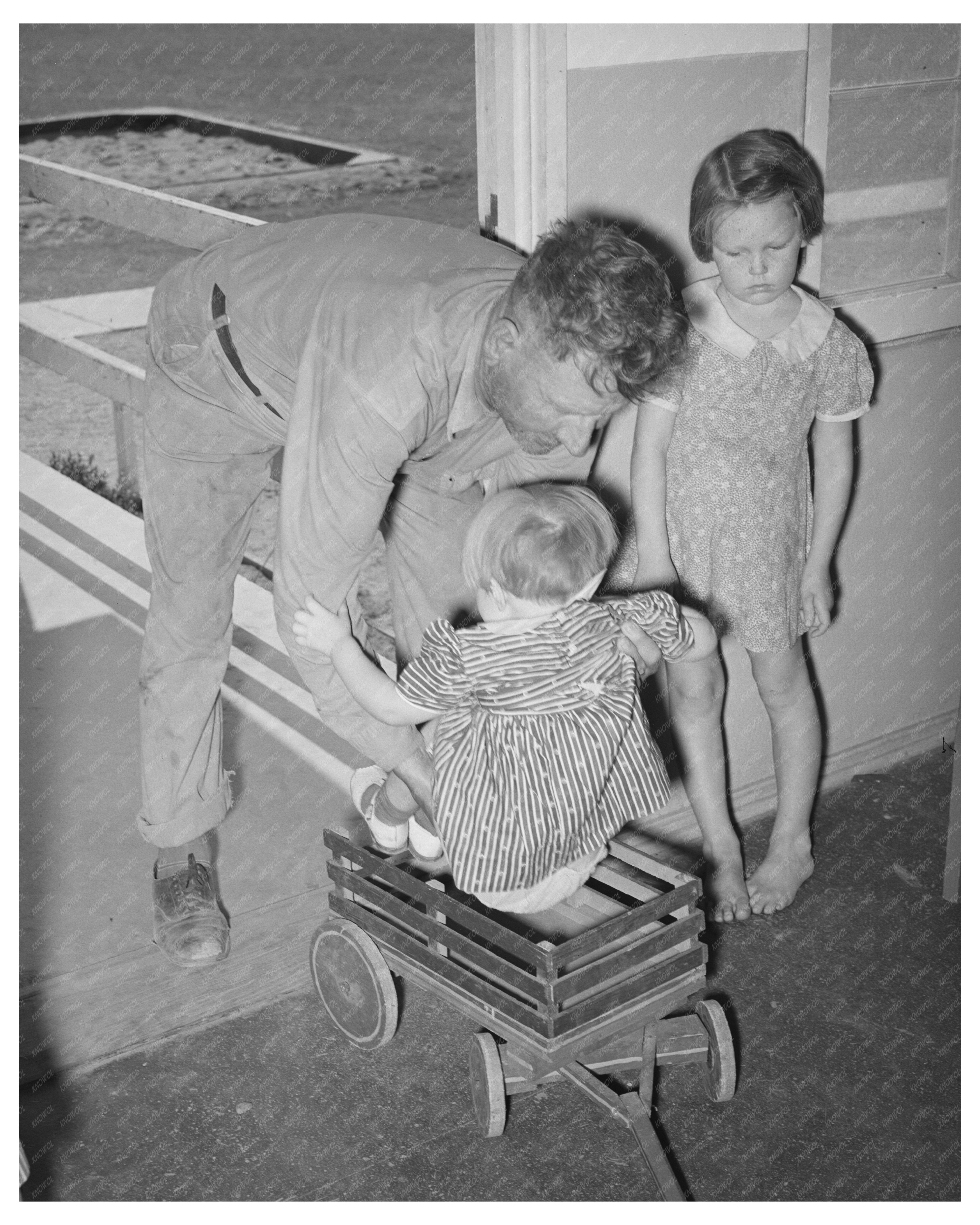 Migratory Worker and Child at WPA Nursery School 1940