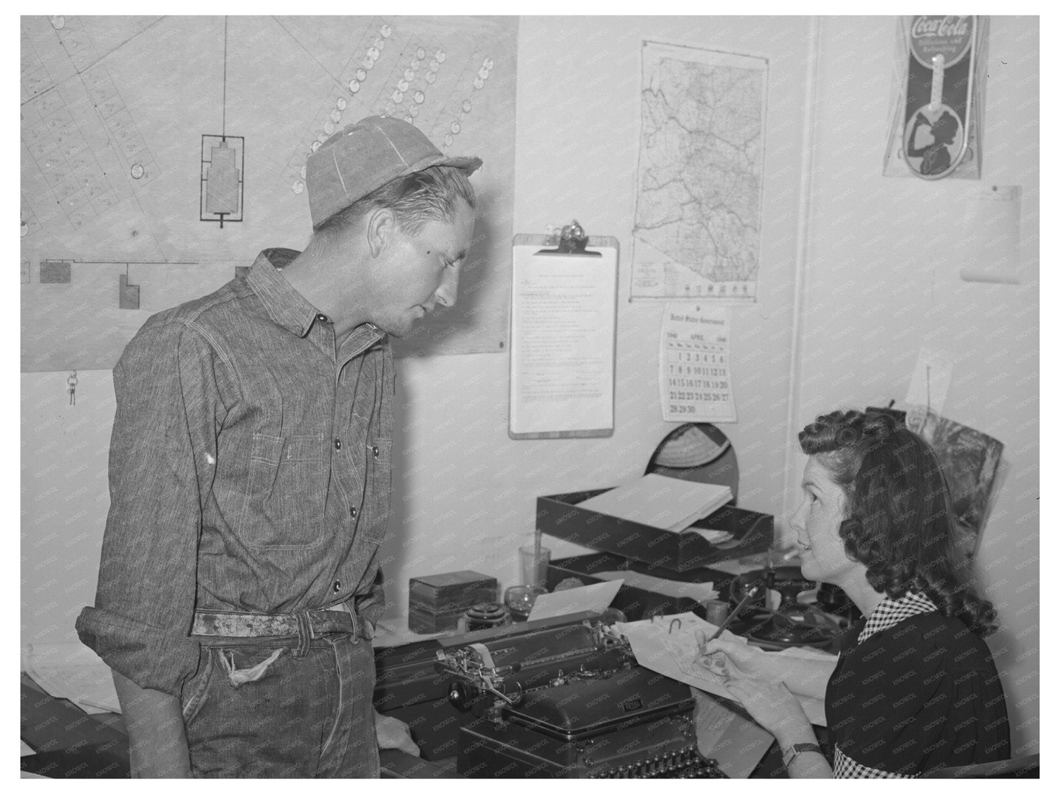 Migratory Worker Checking Out of Agua Fria Camp 1940
