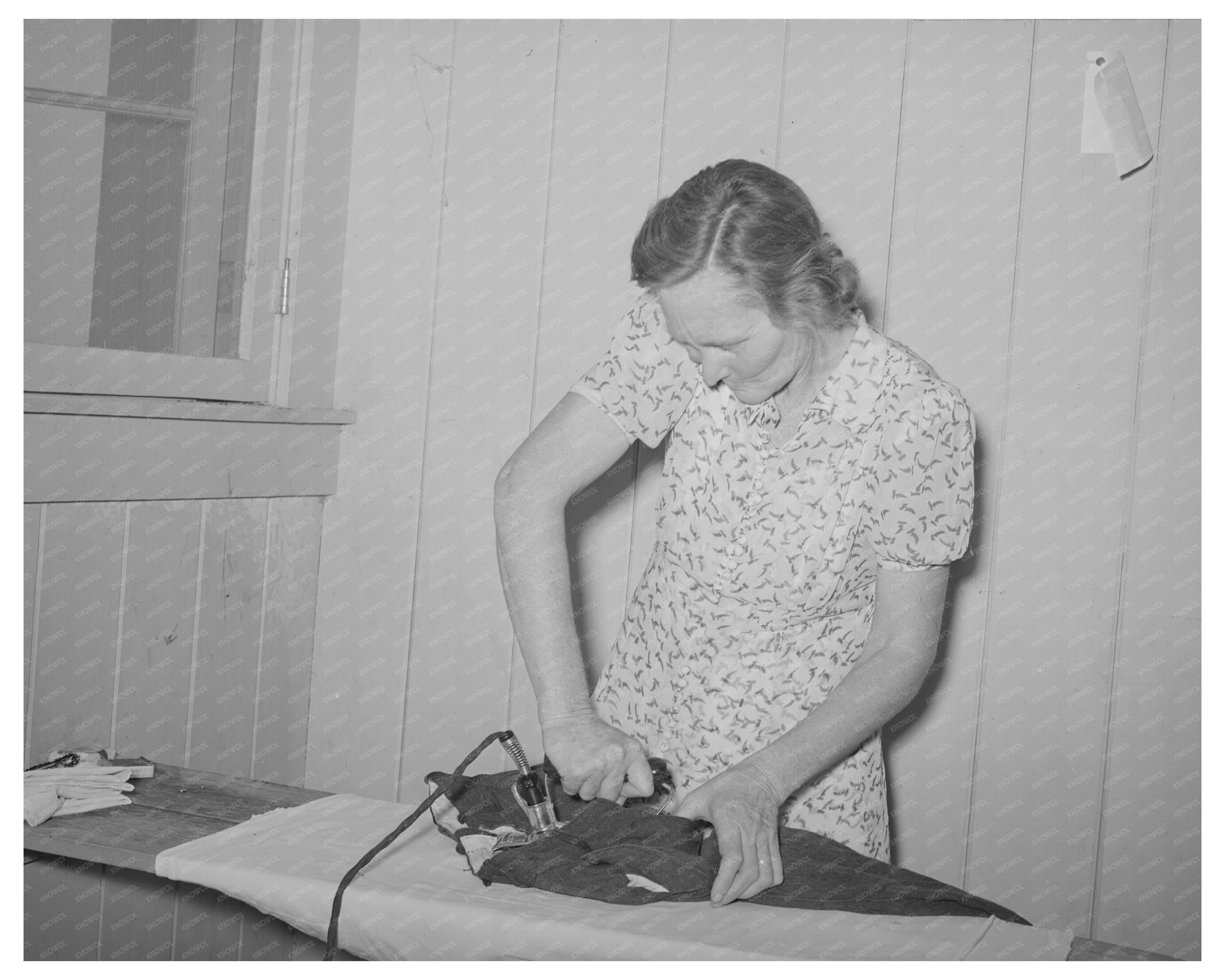 Woman Ironing at Agua Fria Labor Camp Arizona 1940