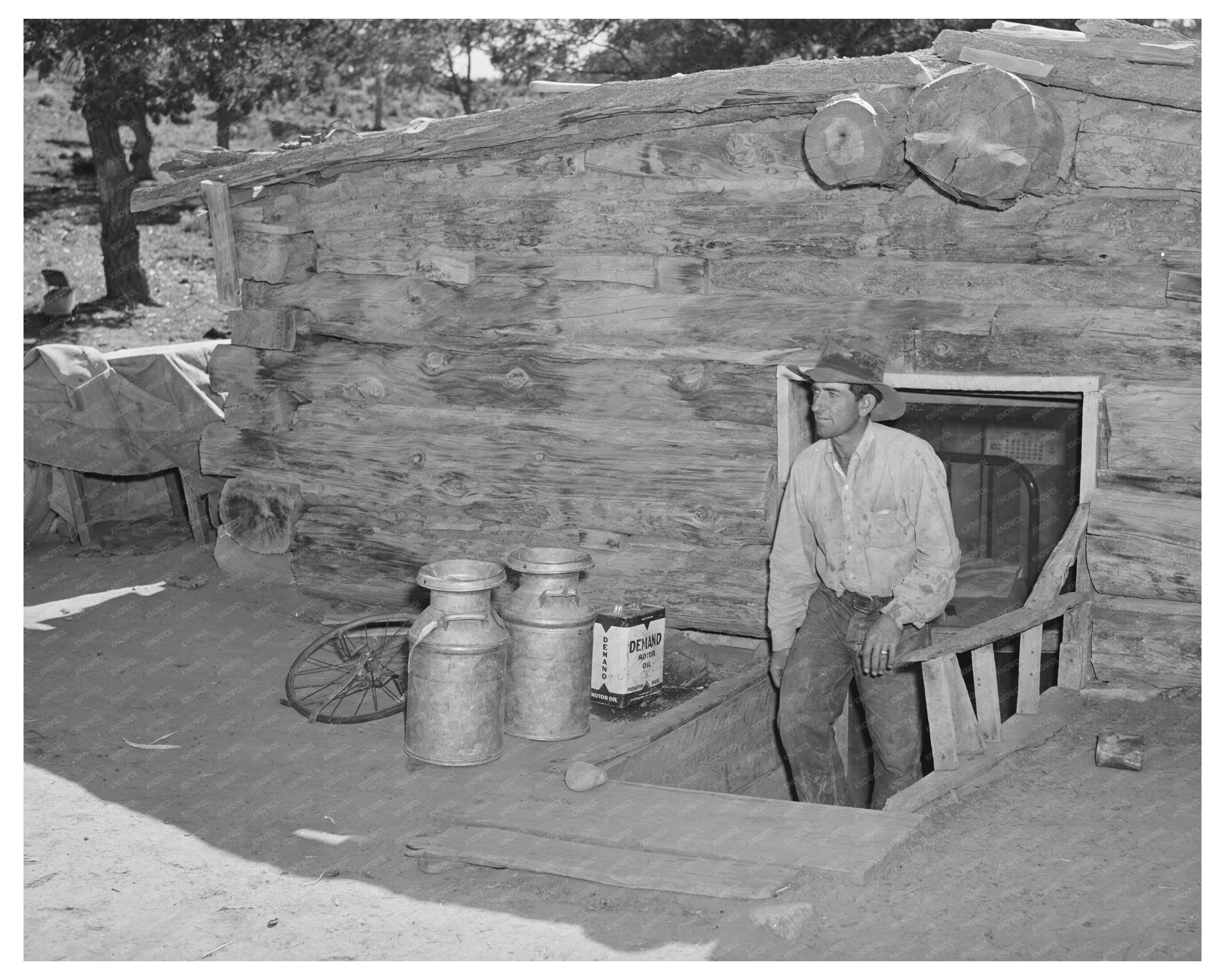 Faro Caudill Emerges from Dugout Pie Town New Mexico 1940