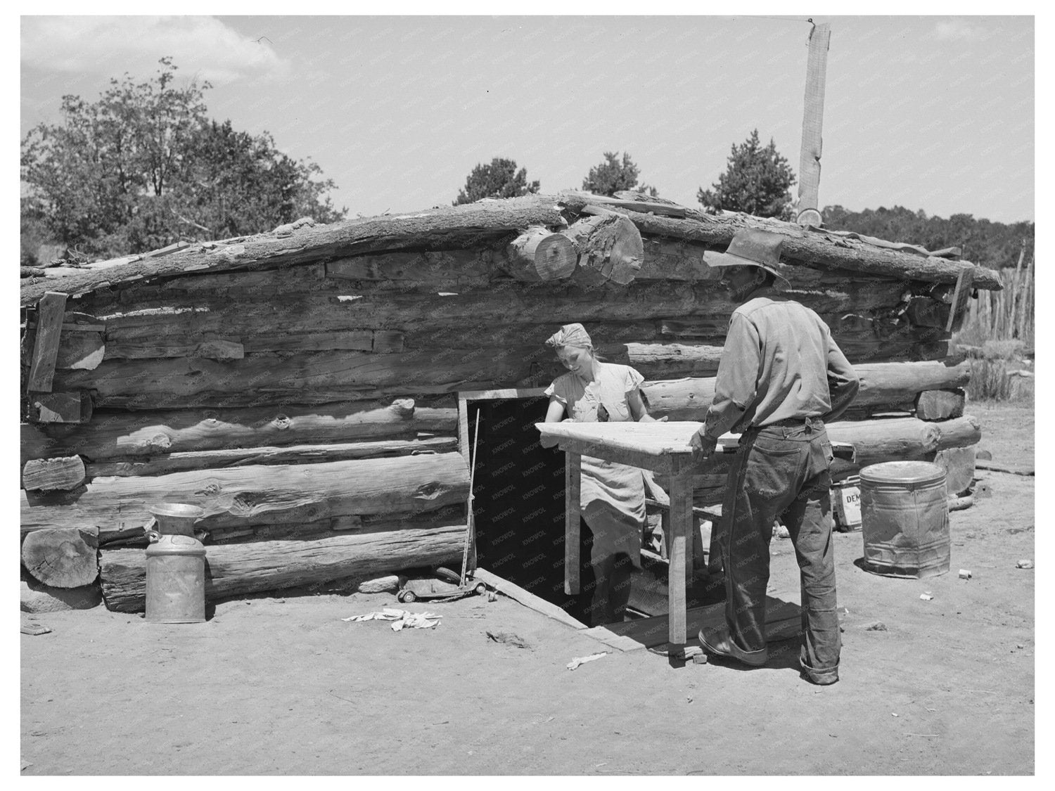 Mr. and Mrs. Faro Caudill Moving Table in Pie Town 1940