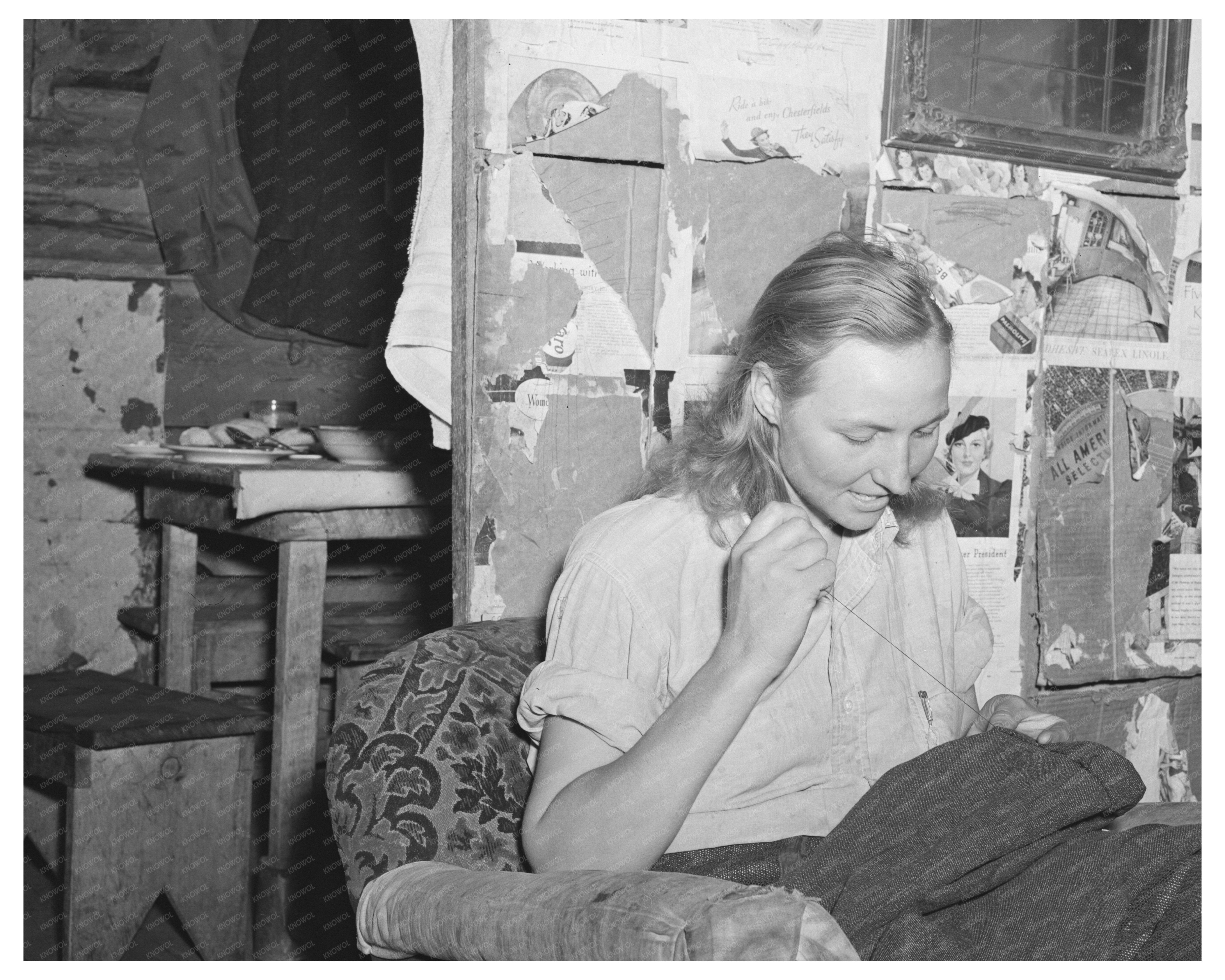 Mrs. Faro Caudill Patching Trousers in Pie Town 1940