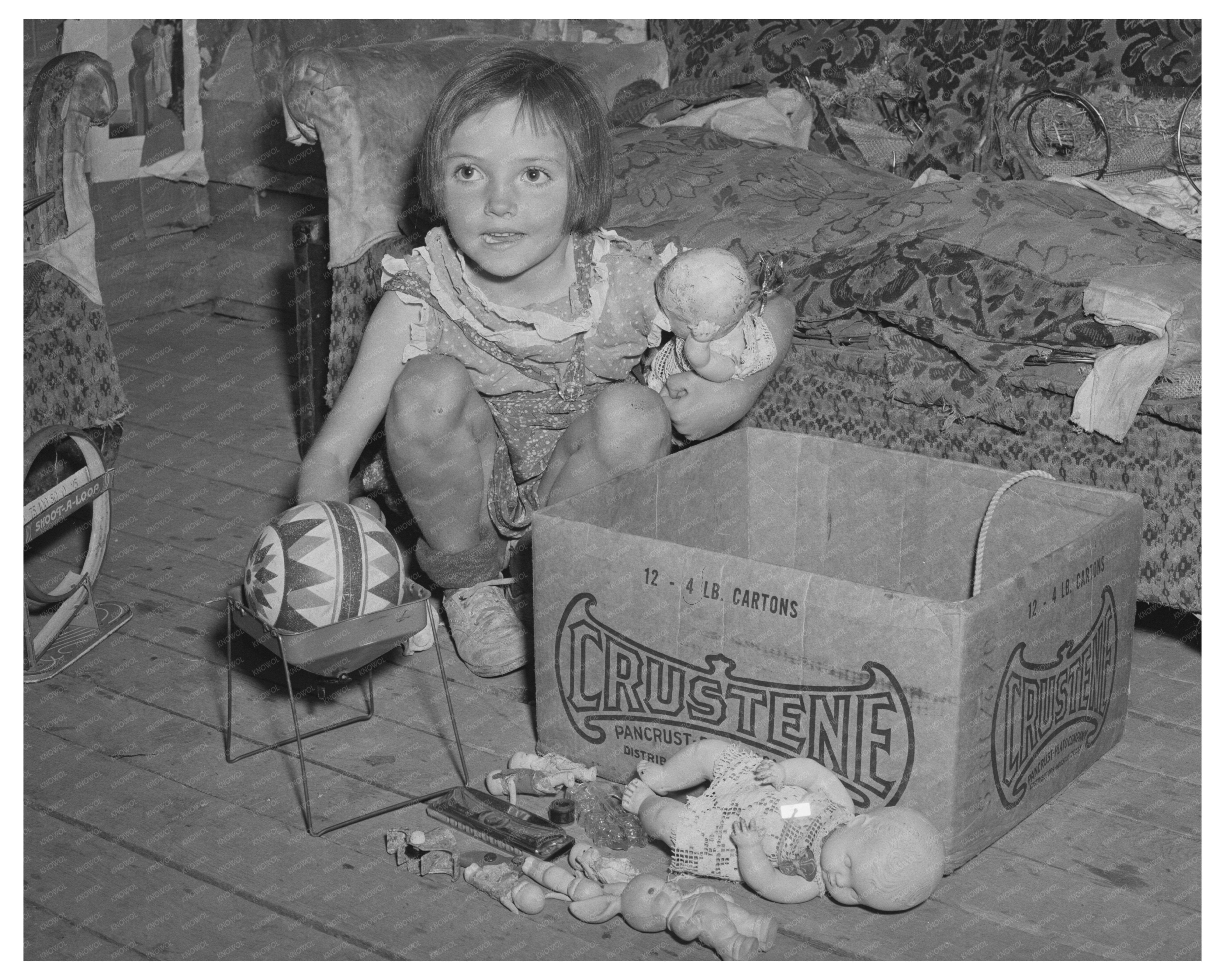 Josie Caudill with Toys in Pie Town New Mexico 1940