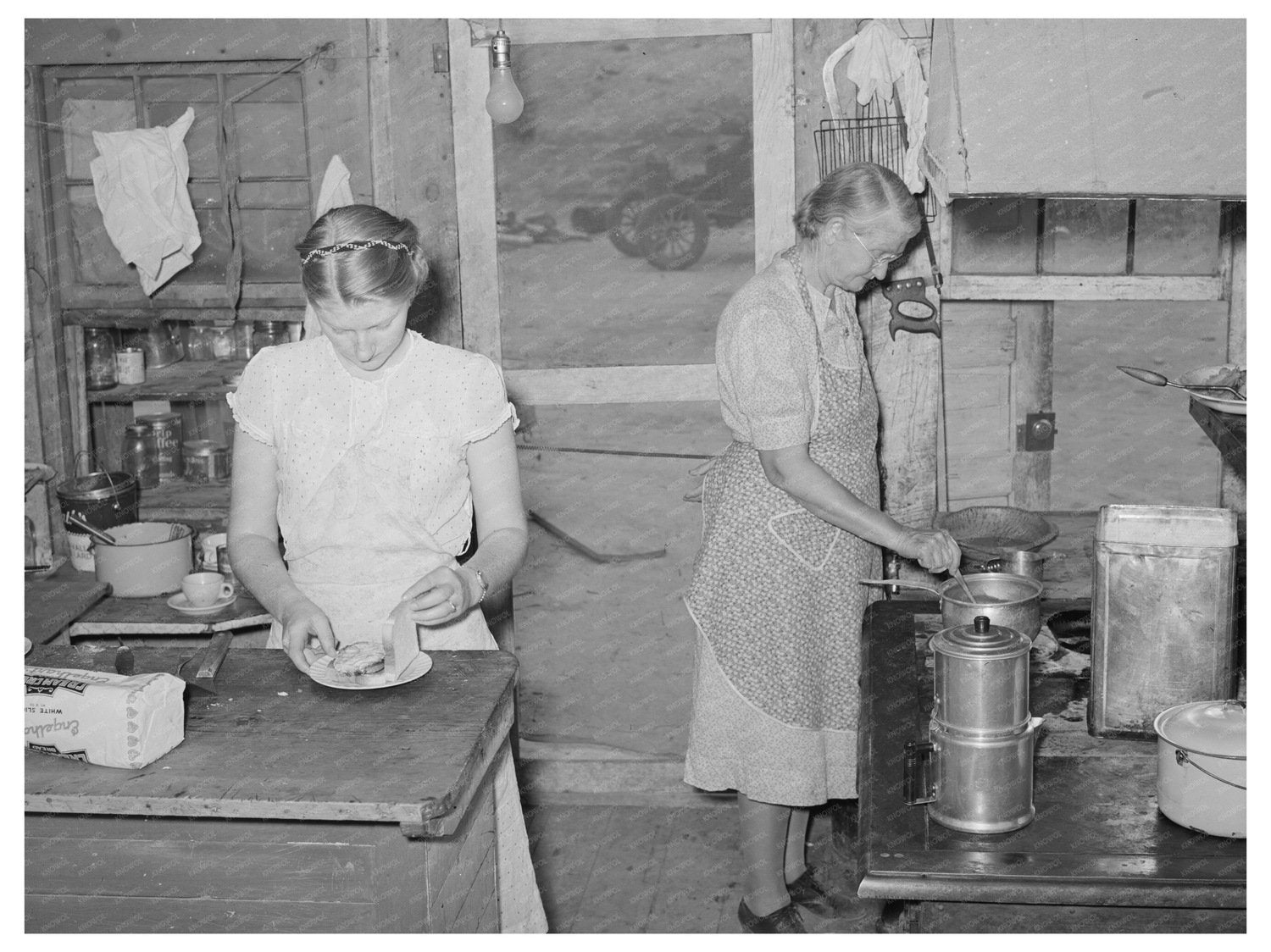 Mother and Daughter in Cafe Kitchen Pie Town New Mexico 1940