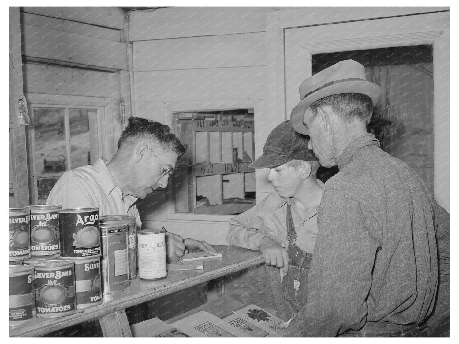 Mr. Keele Preparing a Bill for Farmer Pie Town 1940