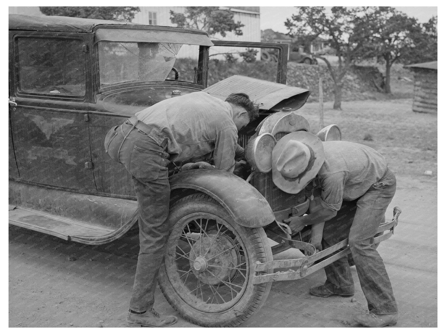 1944 Young Man Working on Car in Pie Town New Mexico