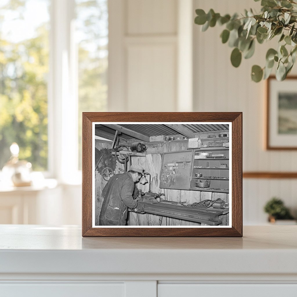 George Hutton Jr. in Farm Machine Shop Pie Town 1940