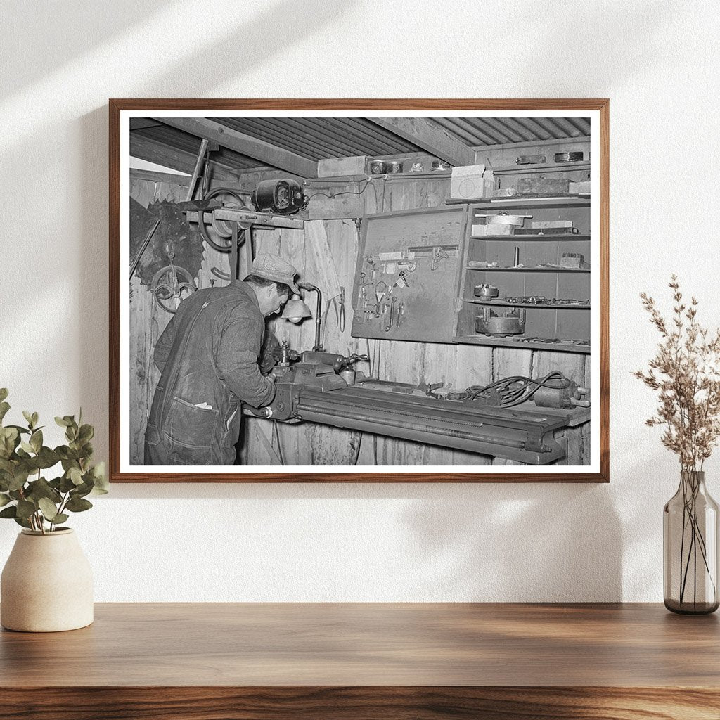 George Hutton Jr. in Farm Machine Shop Pie Town 1940