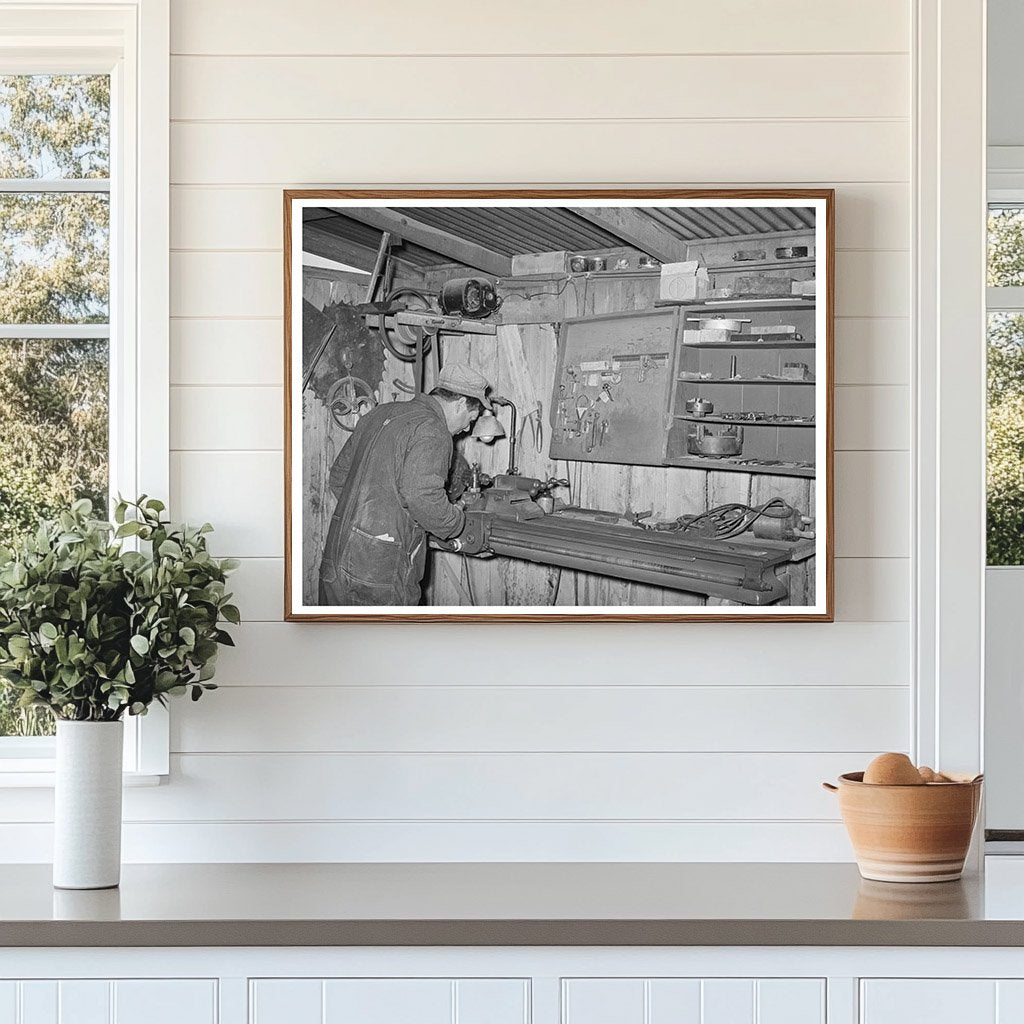 George Hutton Jr. in Farm Machine Shop Pie Town 1940