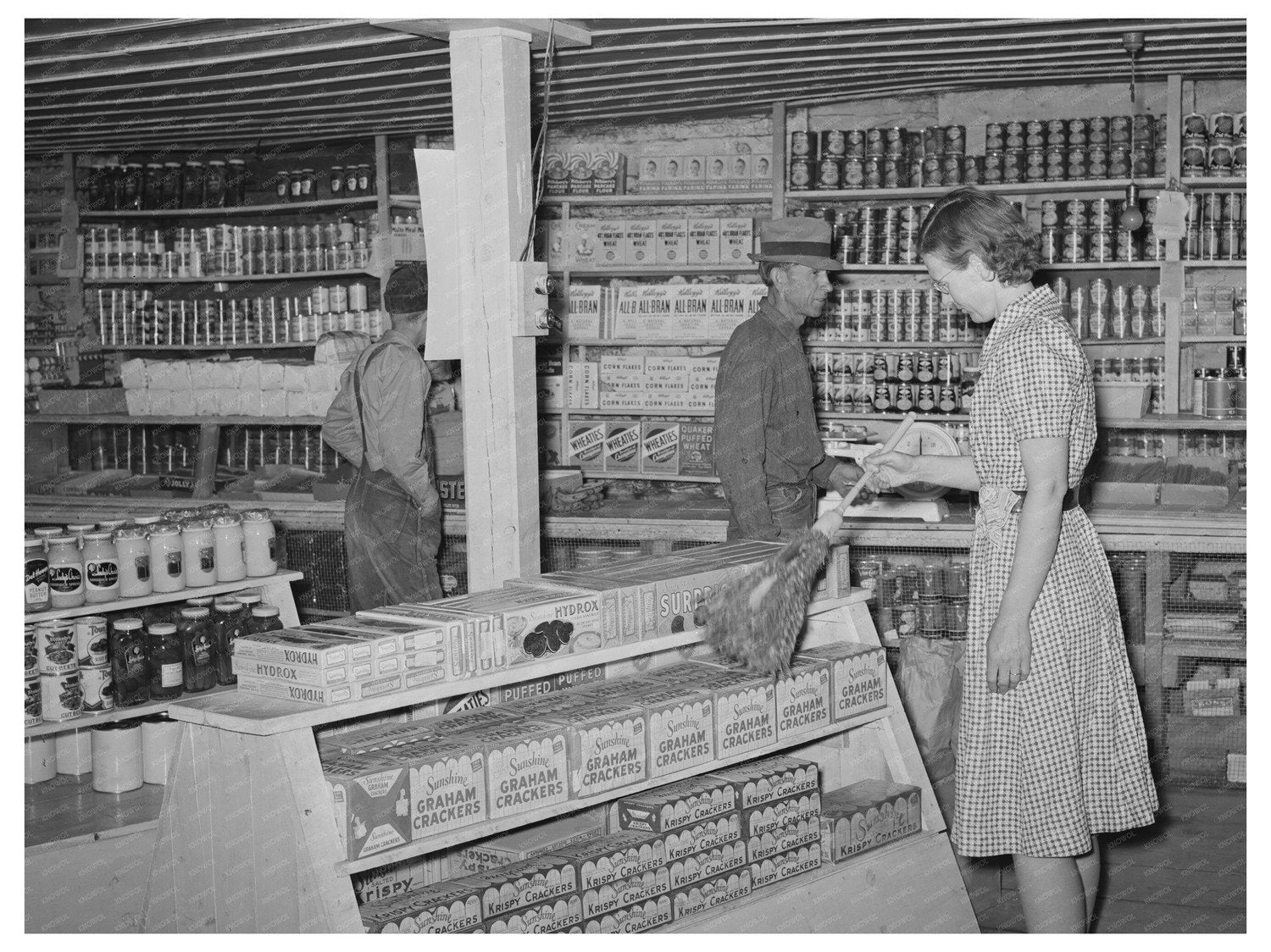 Clerk Dusting Merchandise in Pie Town New Mexico 1940