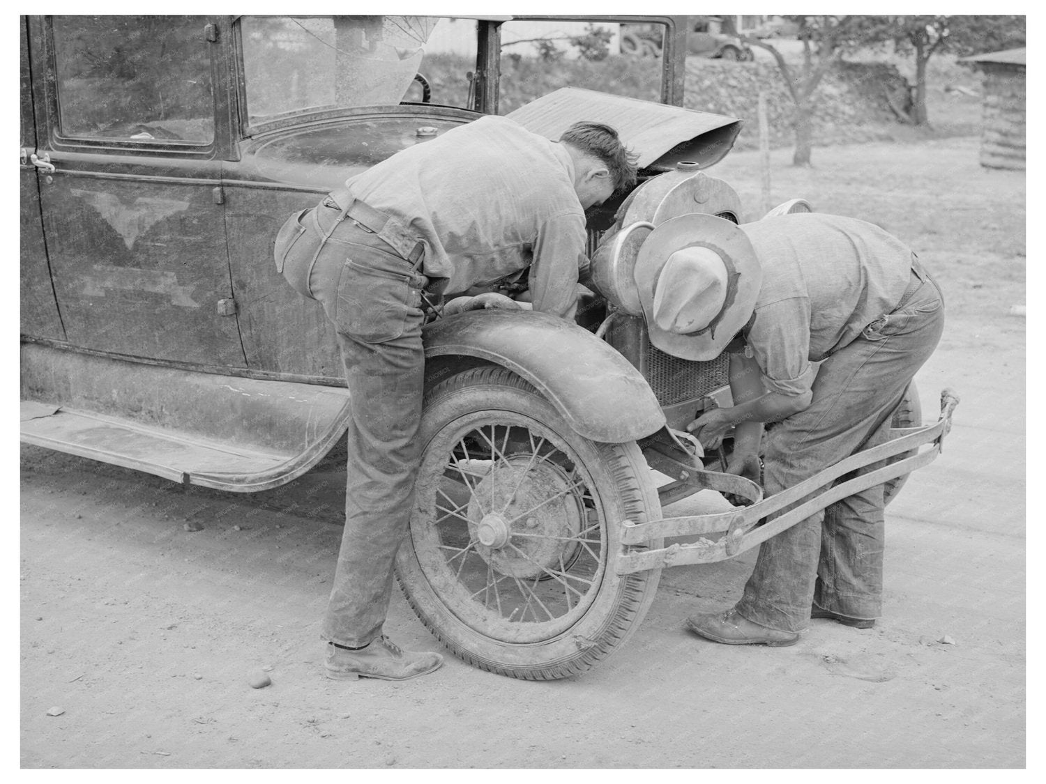 Young Man Working on Car in Pie Town New Mexico 1940