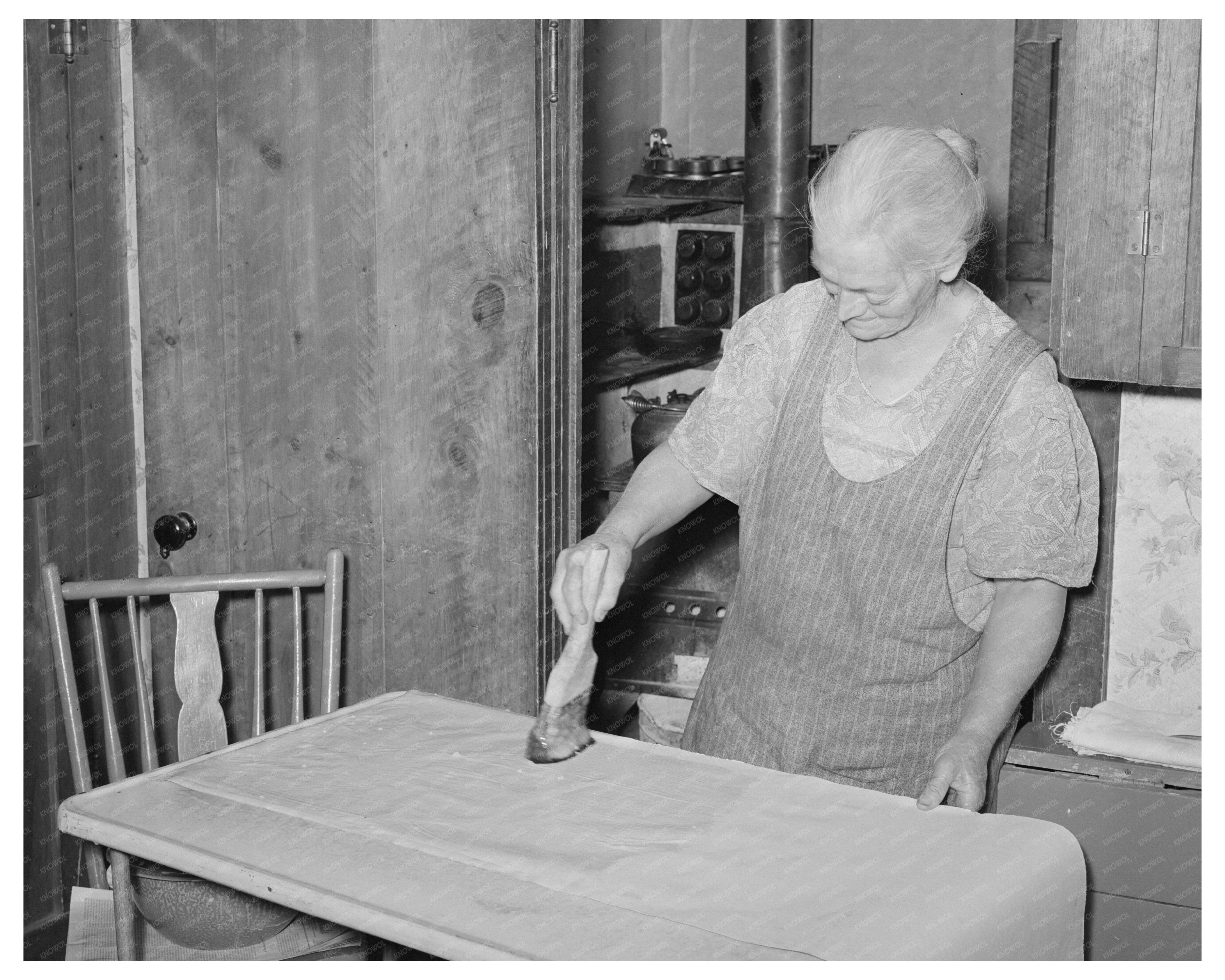 Mrs. George Hutton Wallpapers Home in Pie Town 1940