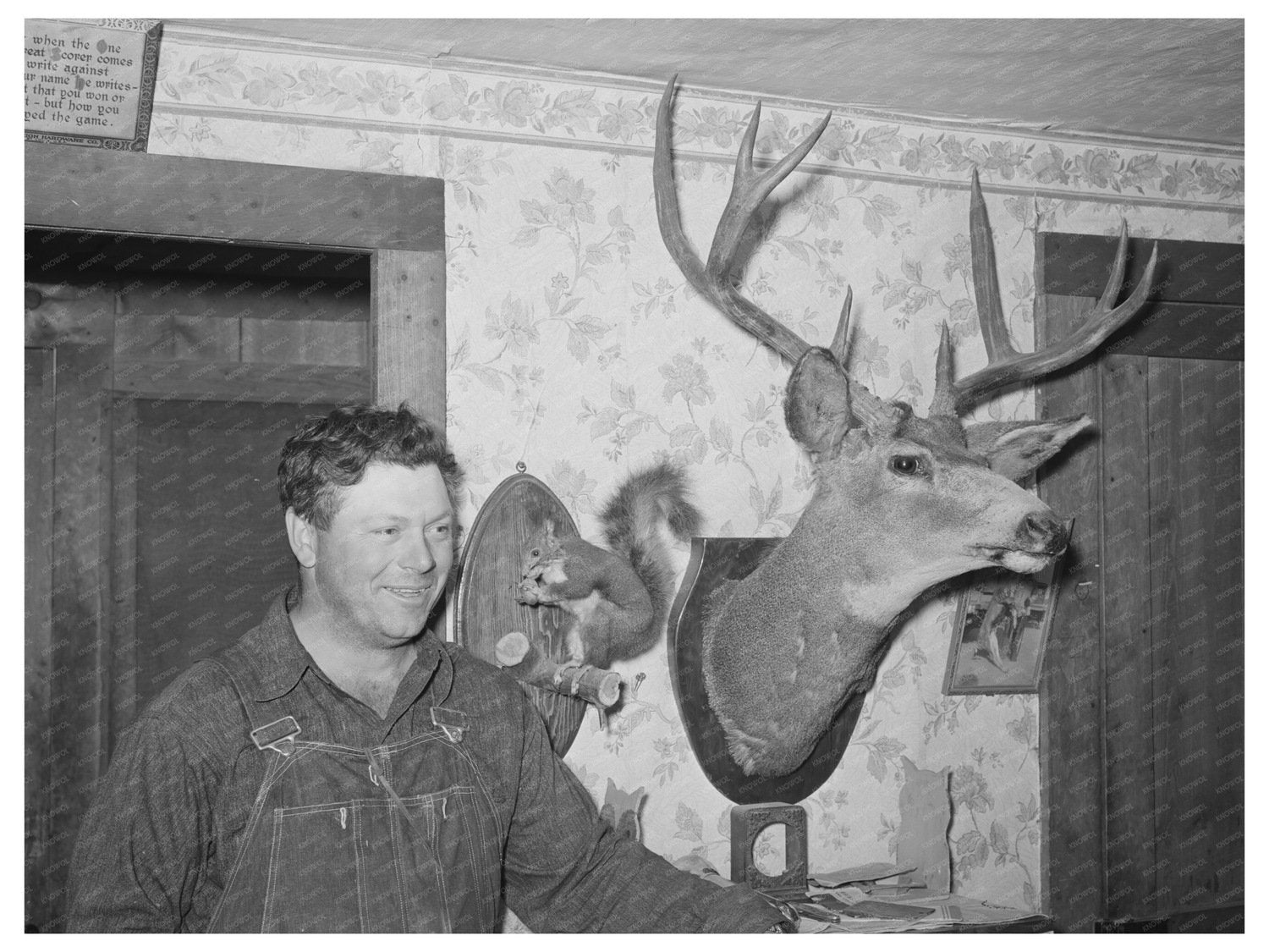 George Hutton Jr. with Mounted Animals Pie Town 1940