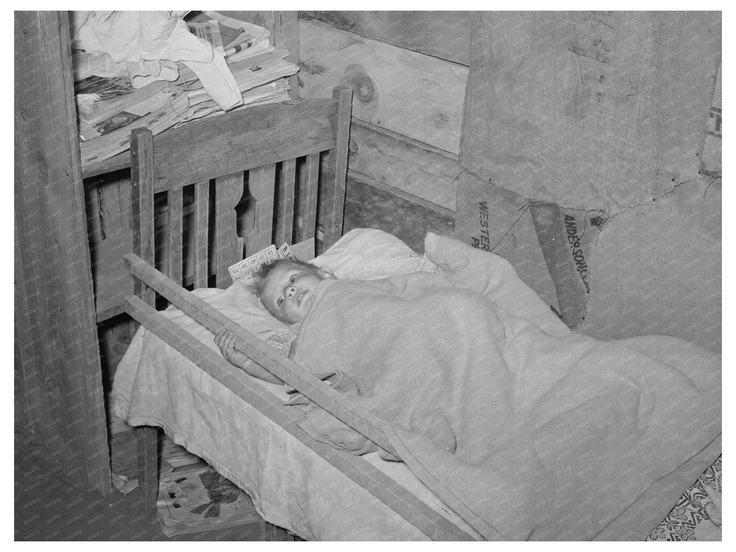 Baby in Homemade Bed Pie Town New Mexico June 1940