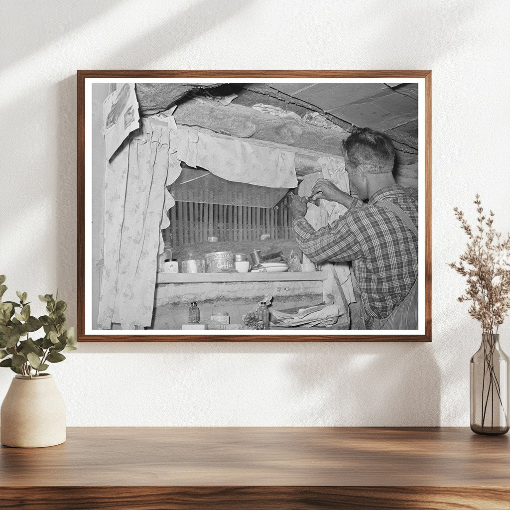 Jack Whinery Repairs Window in Dugout June 1940