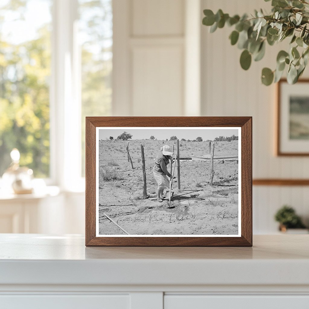 Mrs. Hutton Irrigating Garden in Pie Town New Mexico 1940
