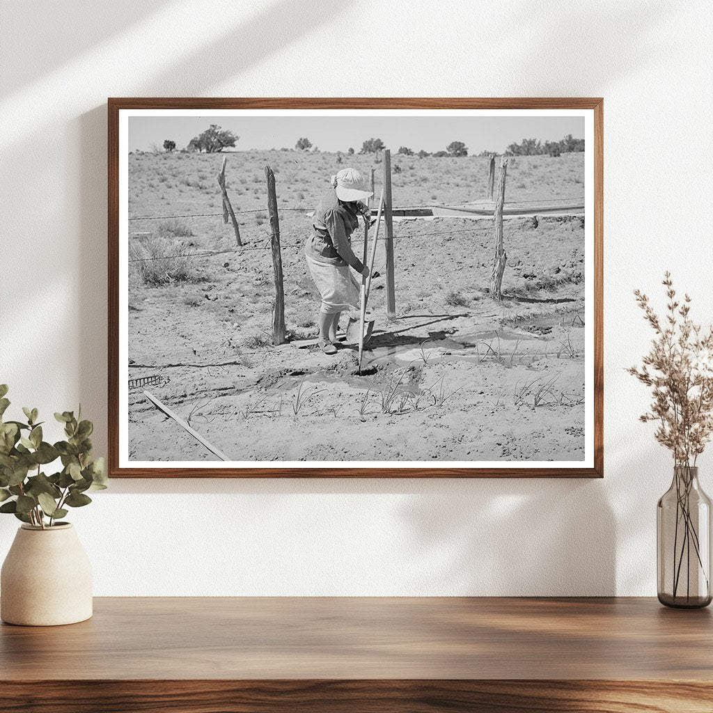 Mrs. Hutton Irrigating Garden in Pie Town New Mexico 1940
