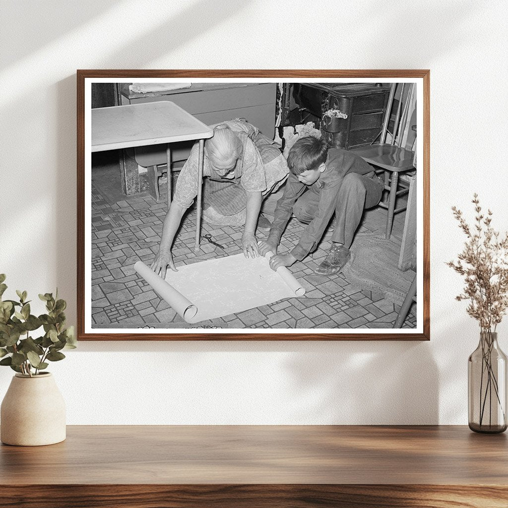Mrs. Hutton and Grandson Wallpapering Kitchen 1940