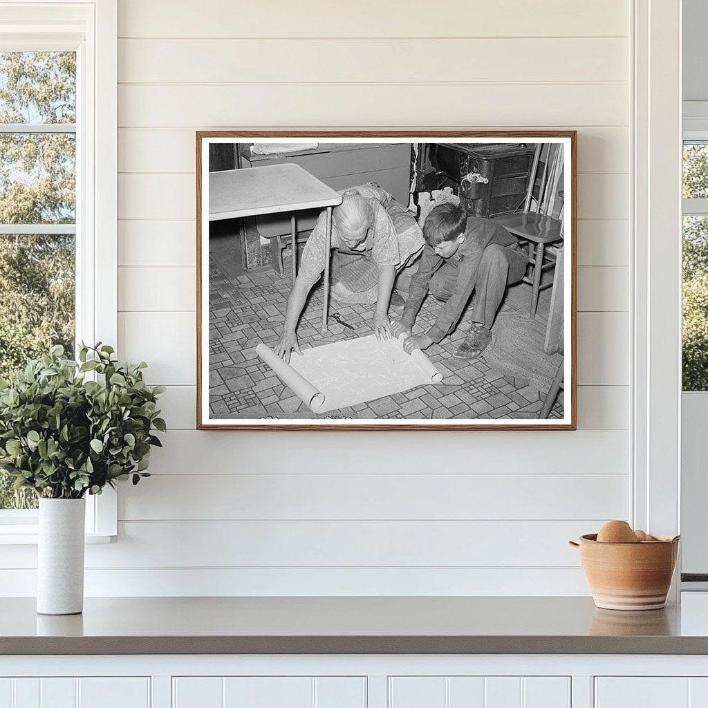 Mrs. Hutton and Grandson Wallpapering Kitchen 1940