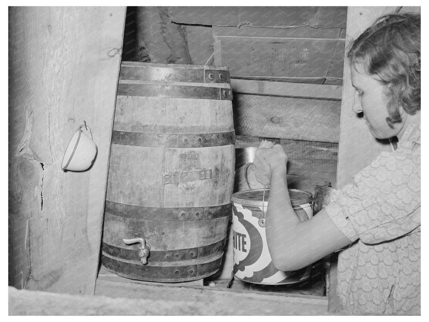 Mrs. Whinery with Milk Bucket in Pie Town New Mexico 1940