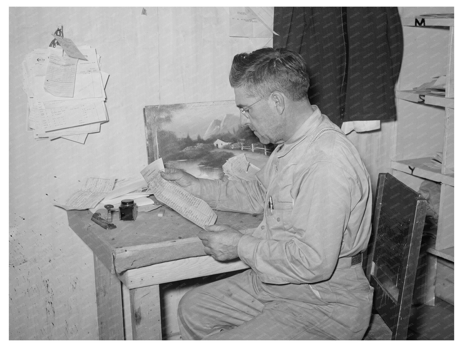 Mr. Keele Reviews Accounts at Pie Town Store 1940