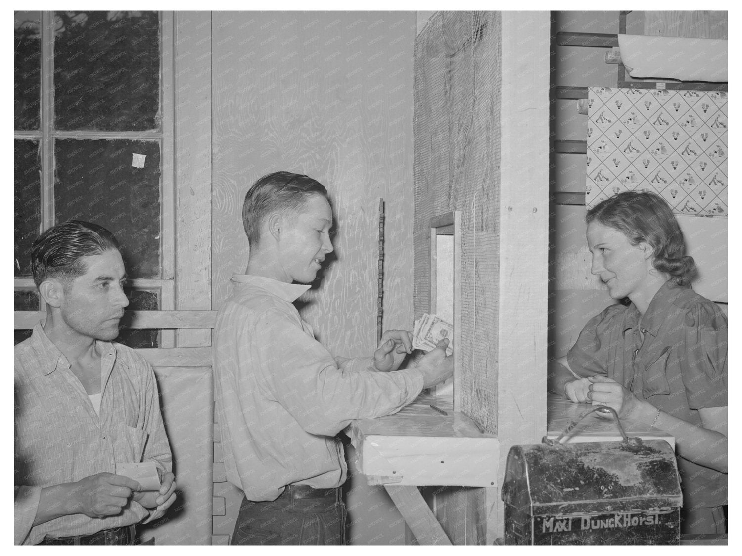 Miner Cashing Check in Mogollon New Mexico June 1940