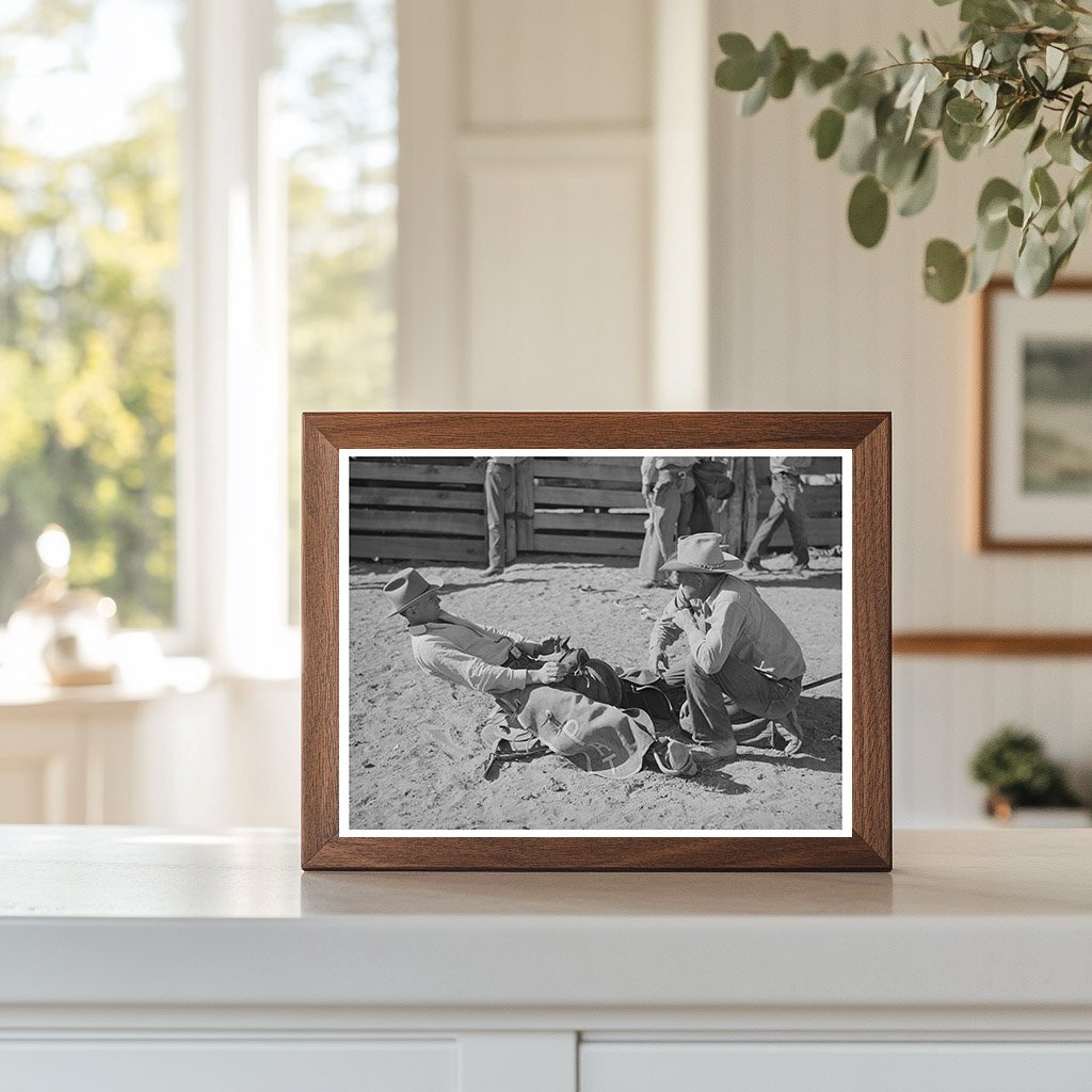 Cowboy Adjusts Stirrup Length for Bronc Busting 1940