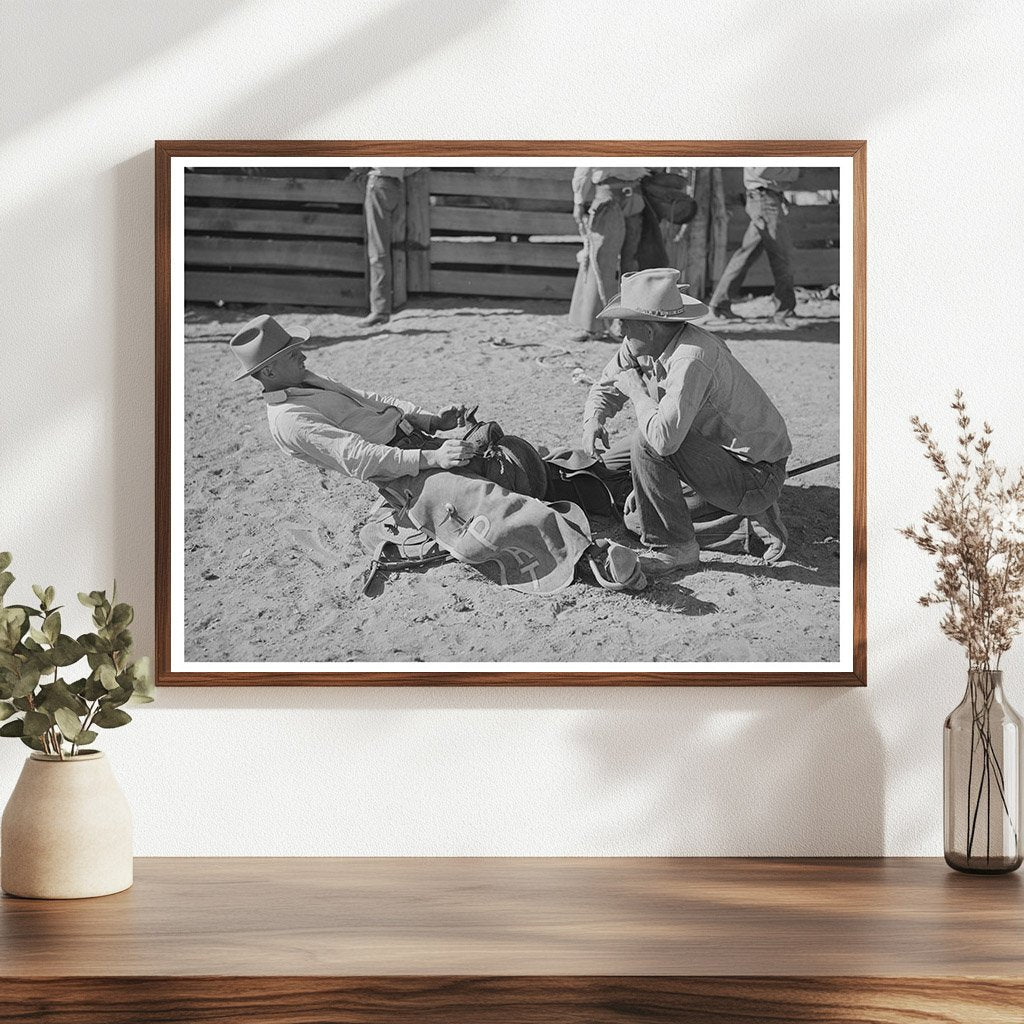 Cowboy Adjusts Stirrup Length for Bronc Busting 1940